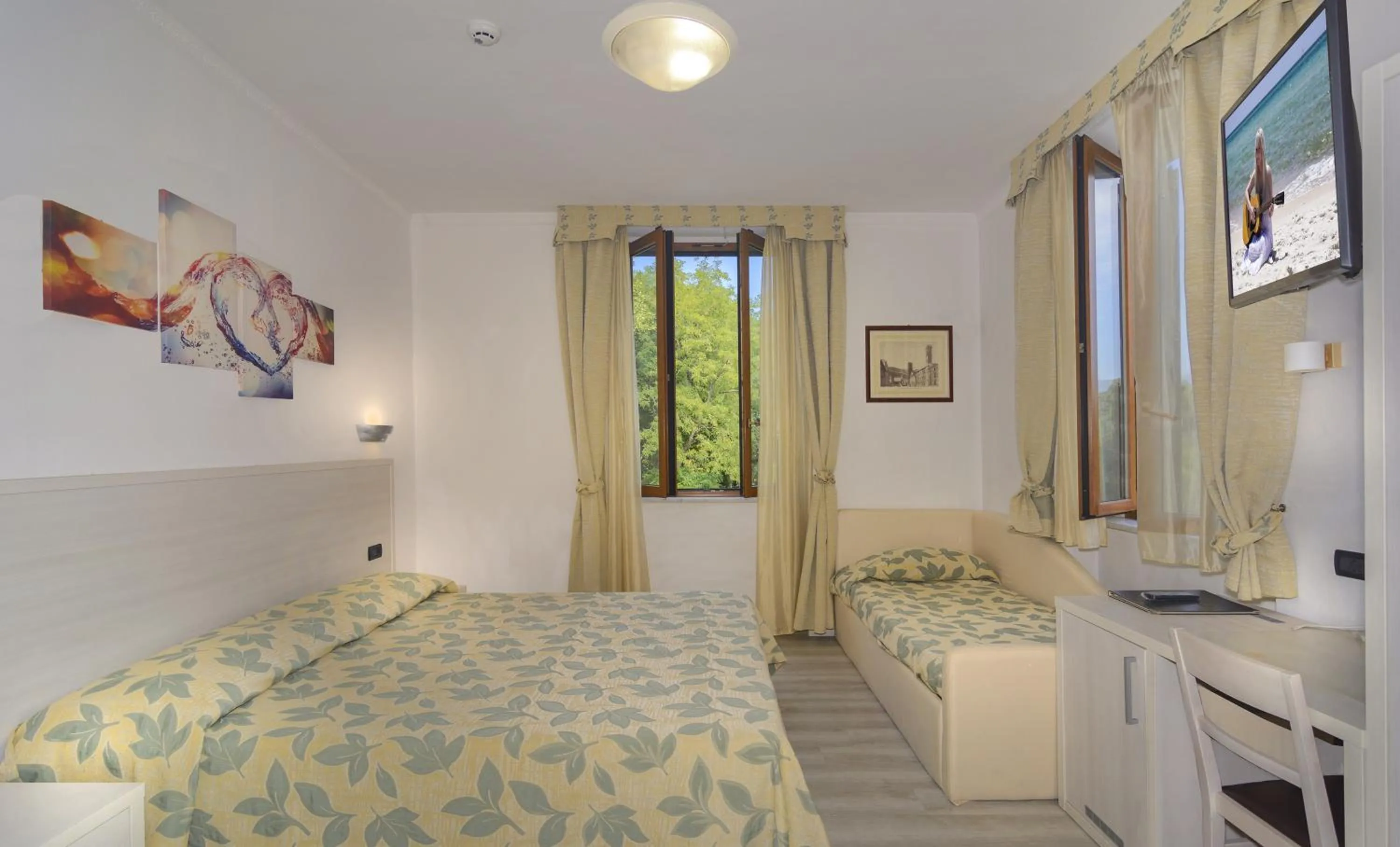 Bed in Hotel Vittoria