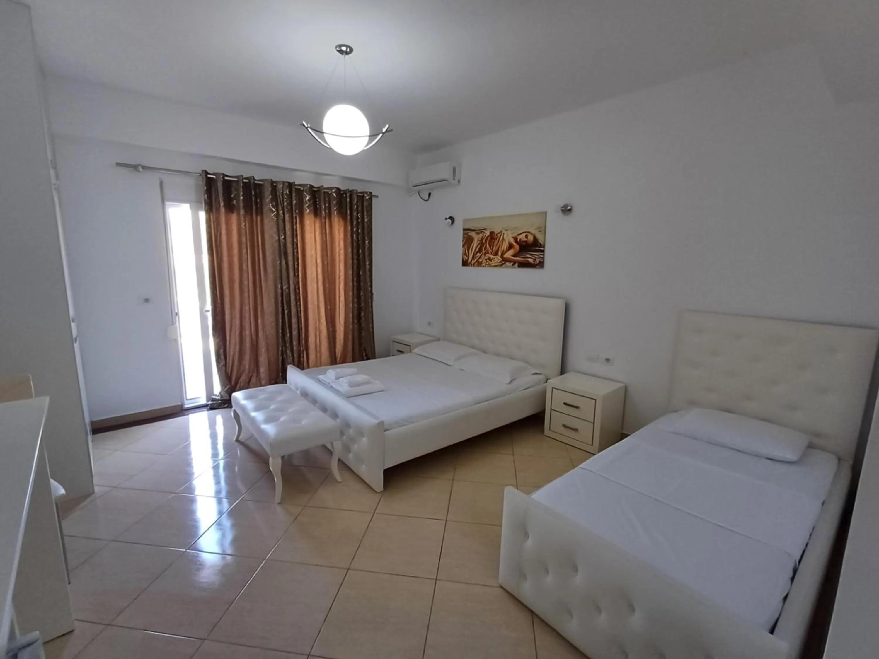 Bed in Hotel Sherifi