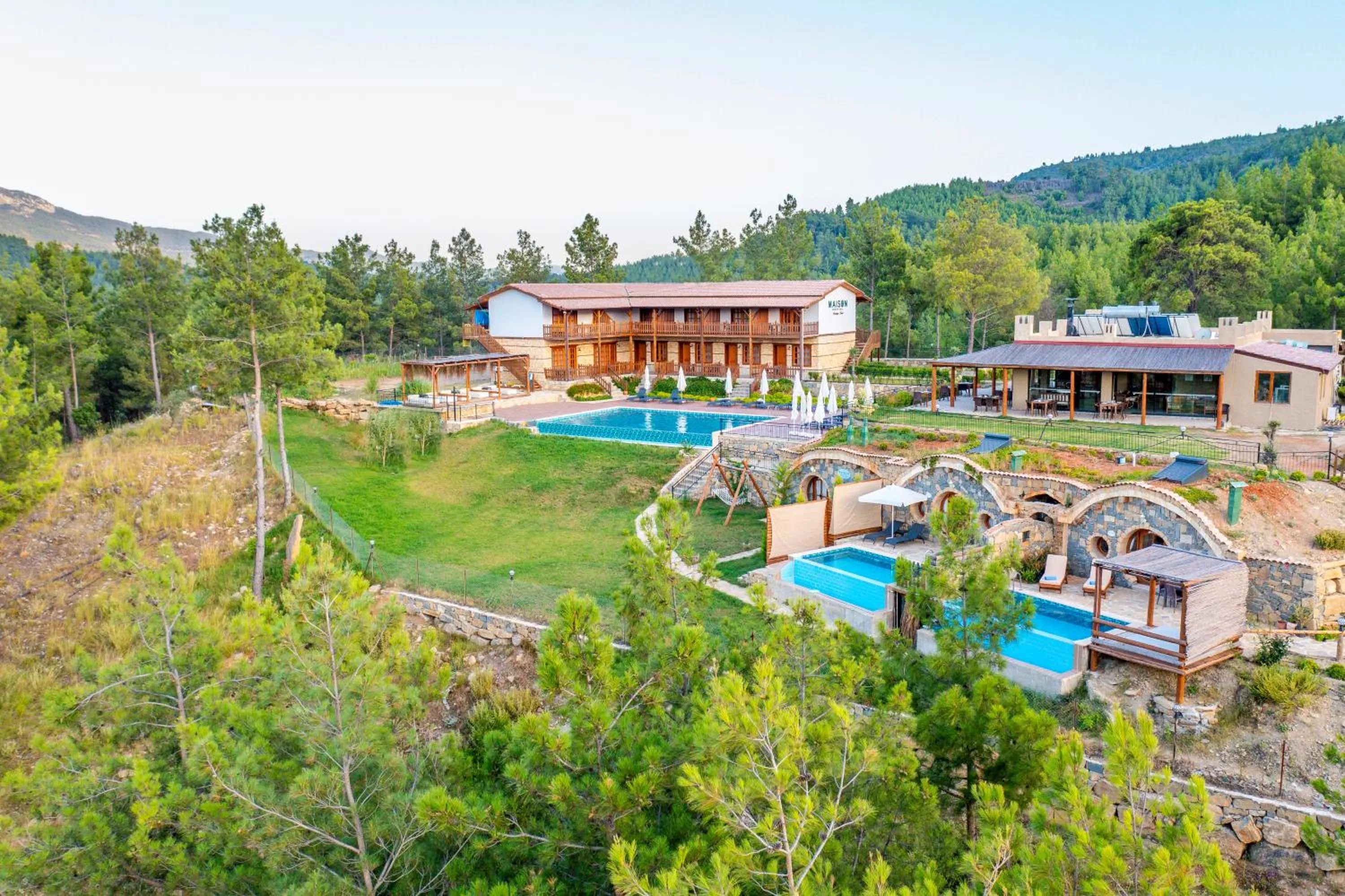 Property building in Maison Green Hill Hobbit Villas & Boutique Hotel