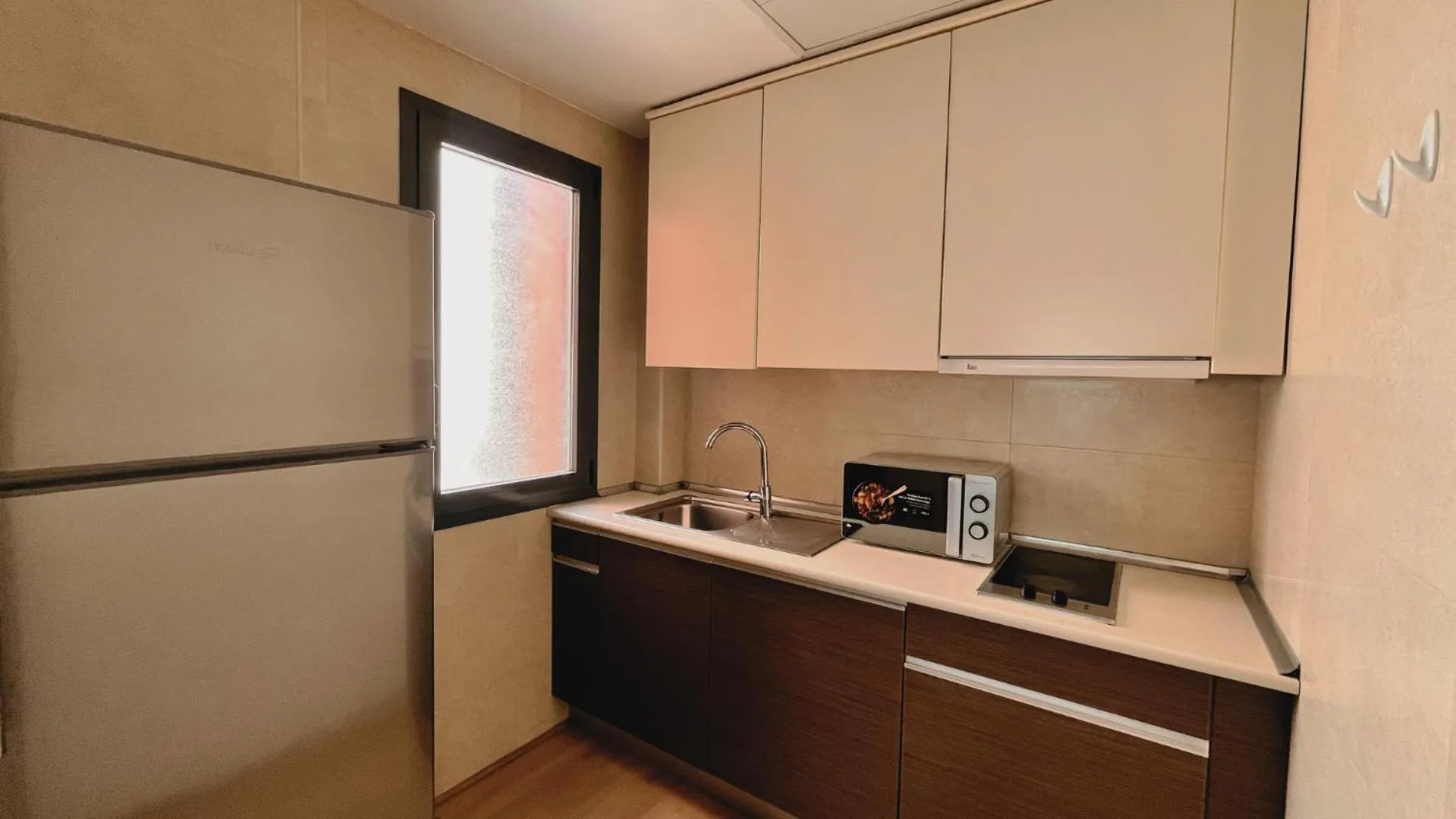 Kitchen or kitchenette in Hotel-Apartamentos Tartesos