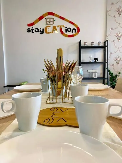 Dining area in Tropicana 218 Macalister Sea & City View by stayCATion Homestay