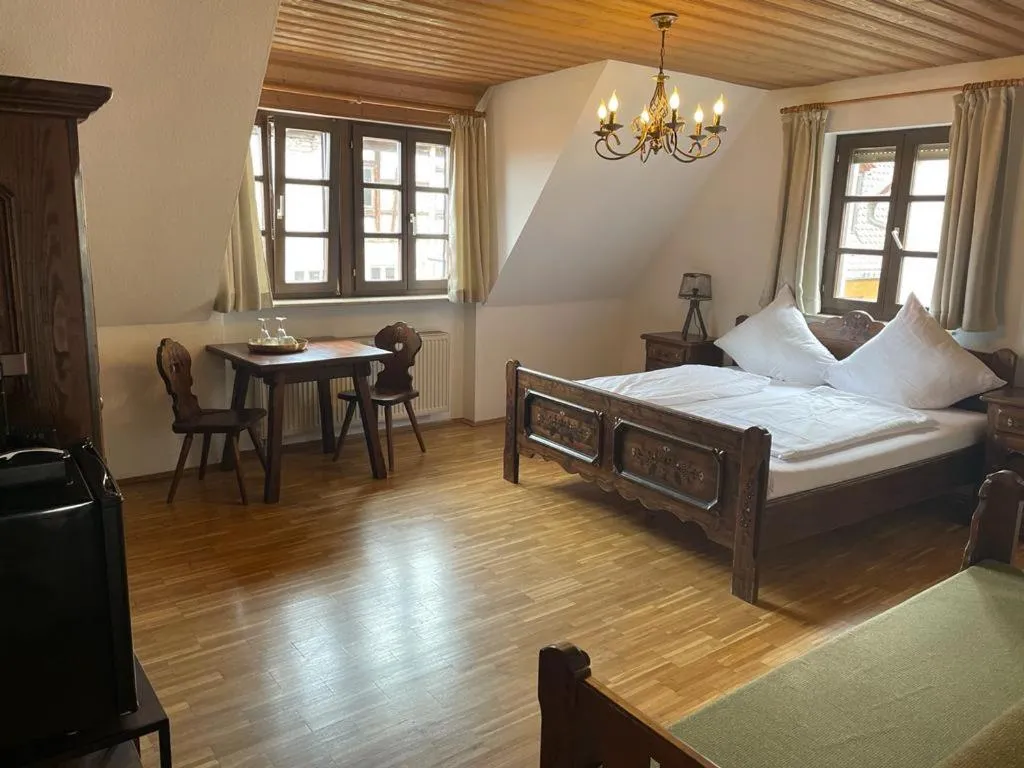 Photo of the whole room, Bed in Hotel und Restaurant Neuhauser