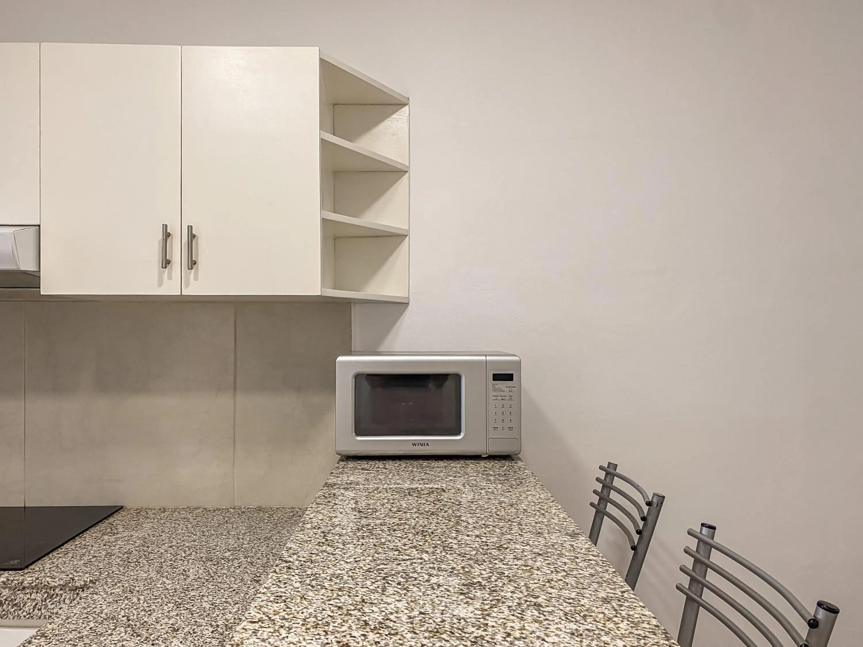 Kitchen or kitchenette in Oceanblue by Andiani Travel
