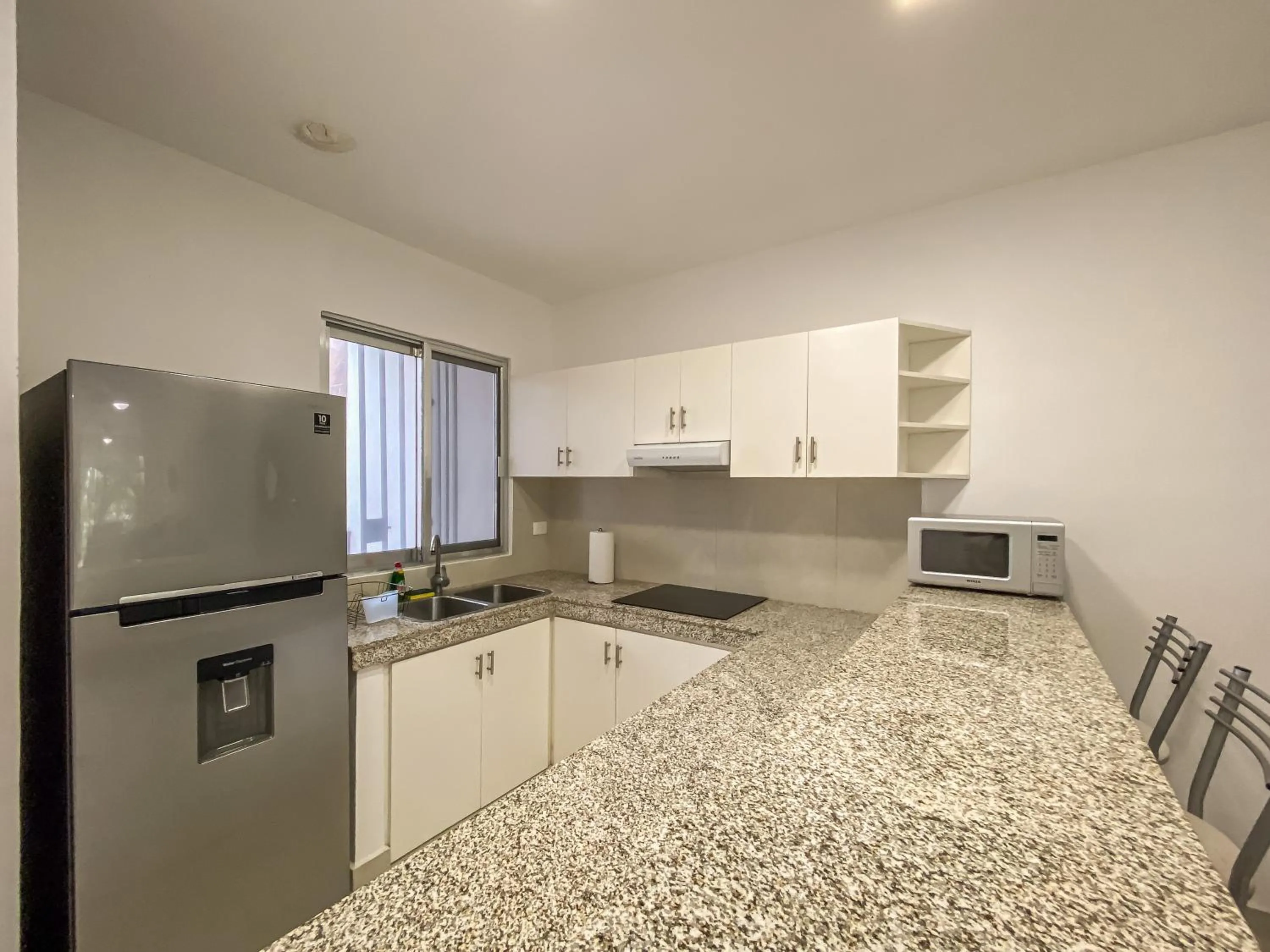 Kitchen or kitchenette in Oceanblue by Andiani Travel