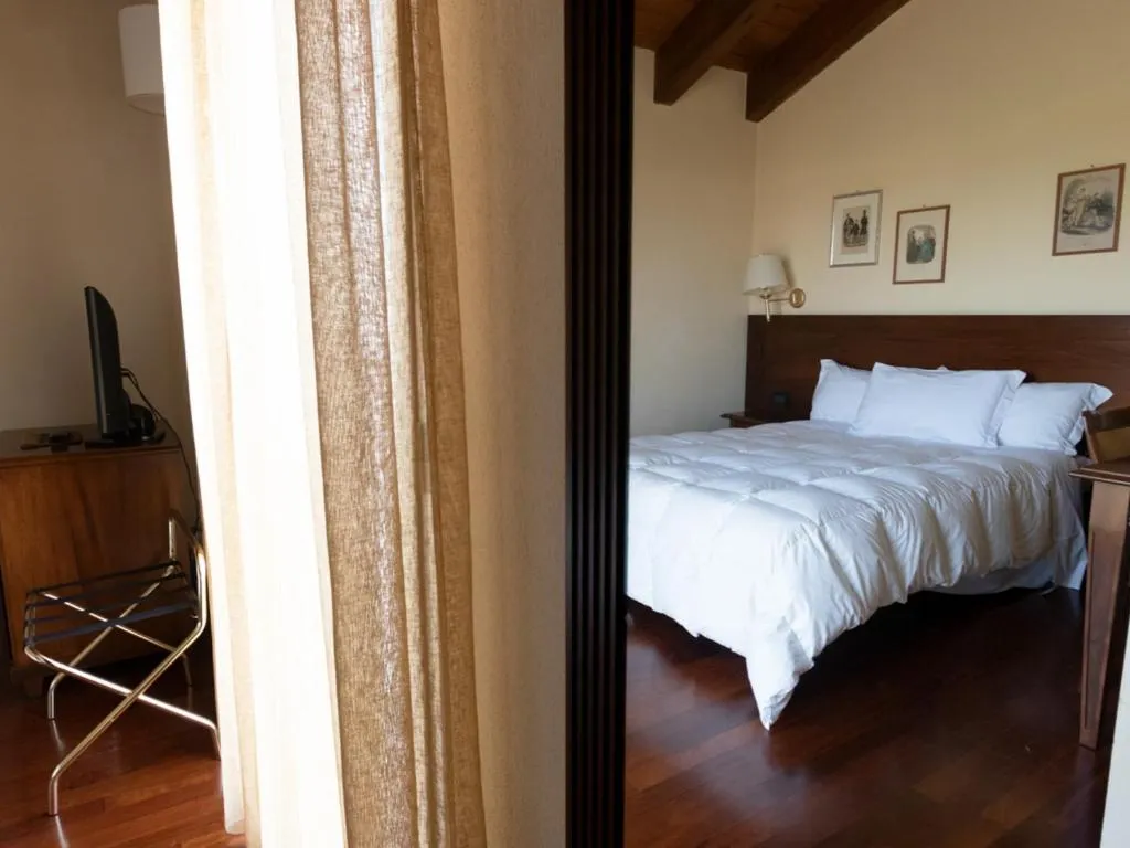 Bed in Hotel Conteverde