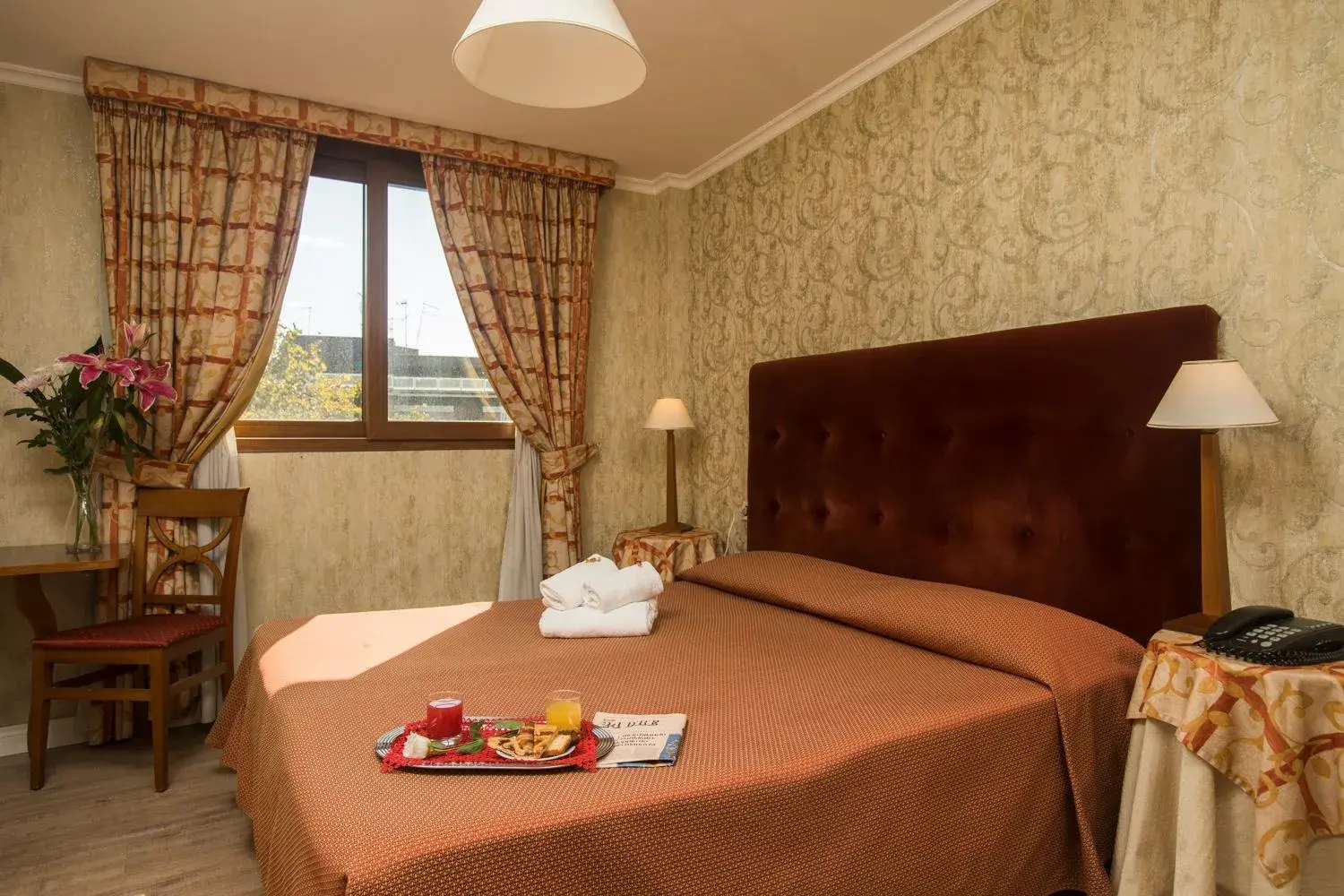 Bed in Hotel Villa Rosa Bed in Hotel Villa Rosa