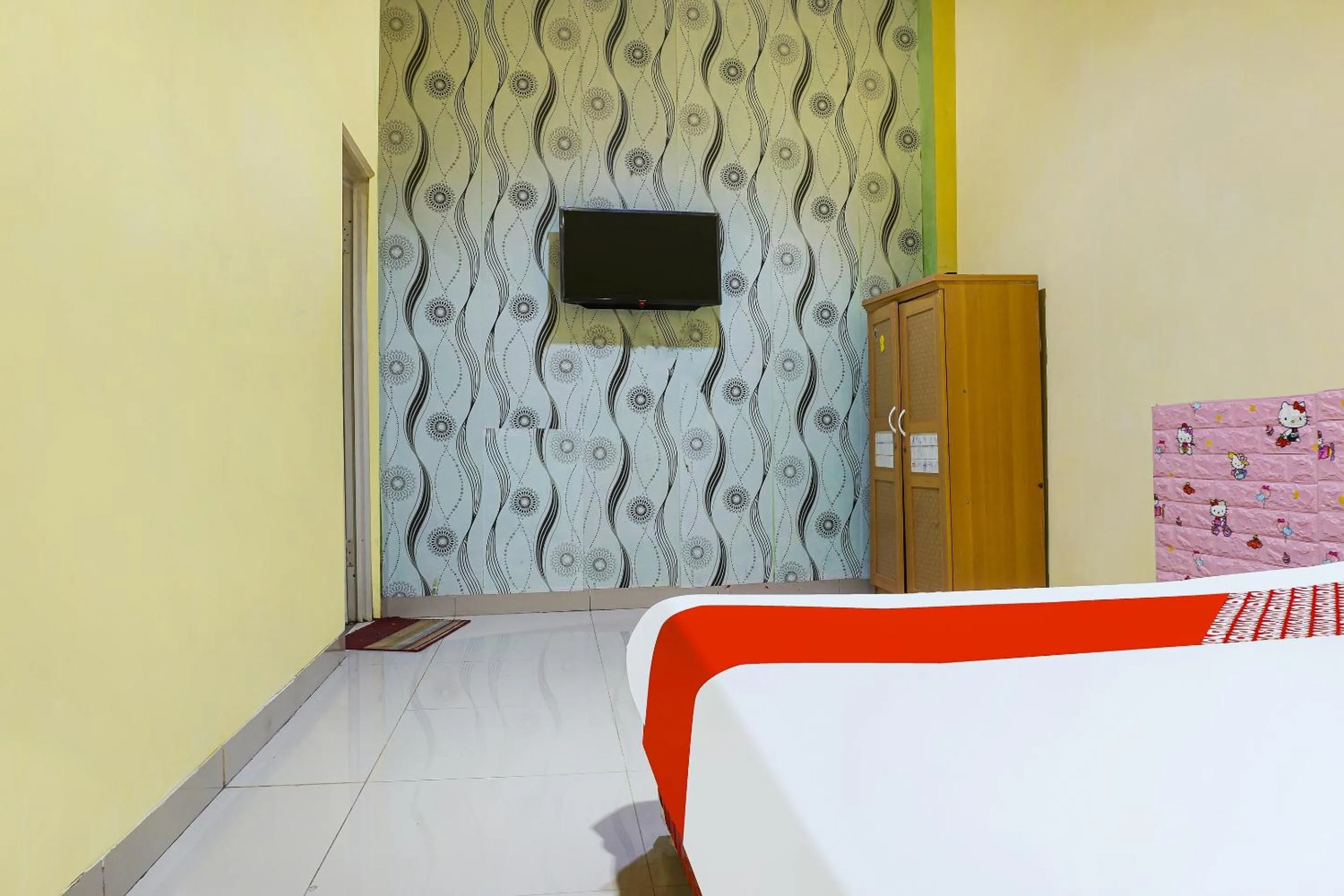 Bedroom in Hotel O Kos'ta Homestay Makassar