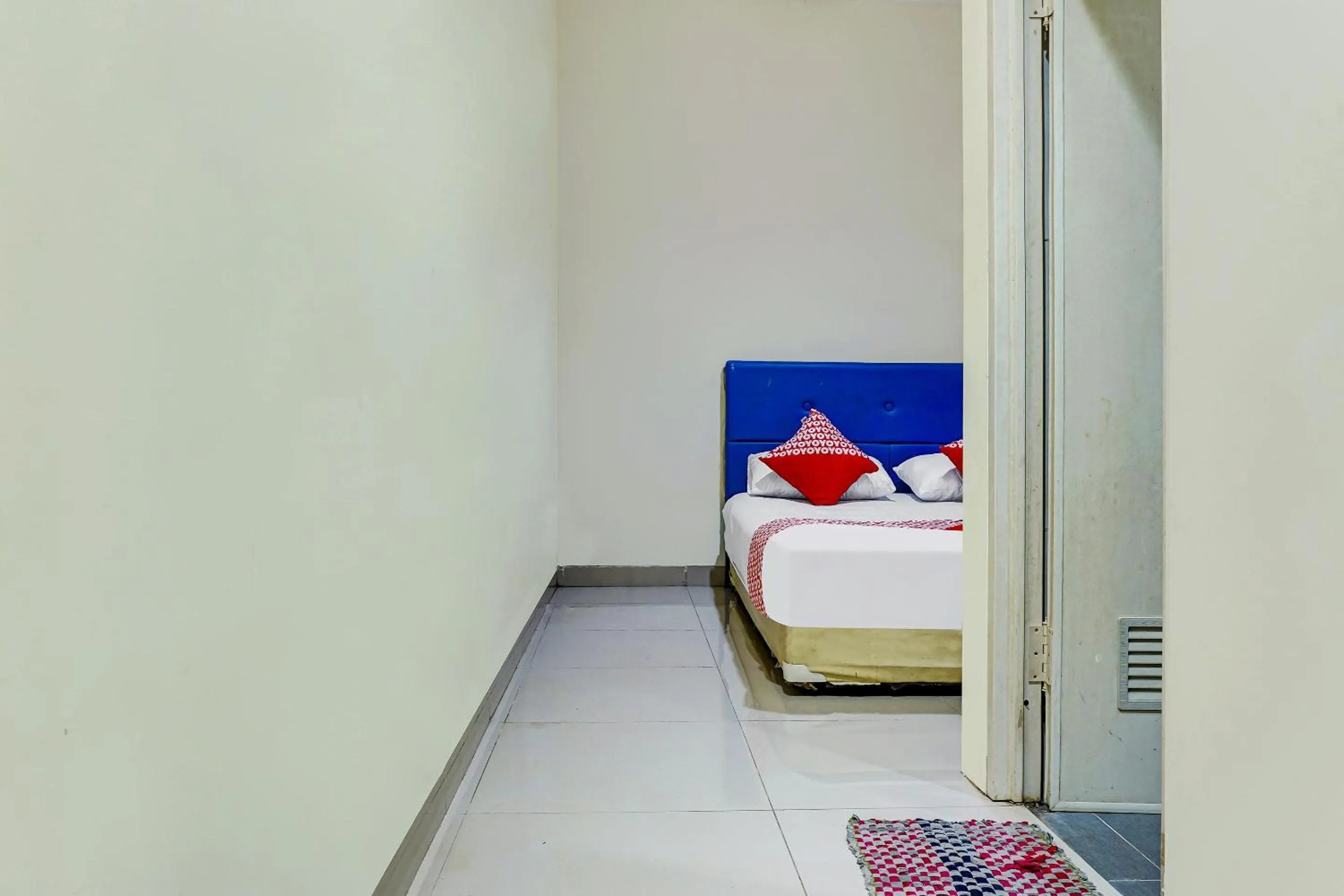 Bedroom in Hotel O Kos'ta Homestay Makassar