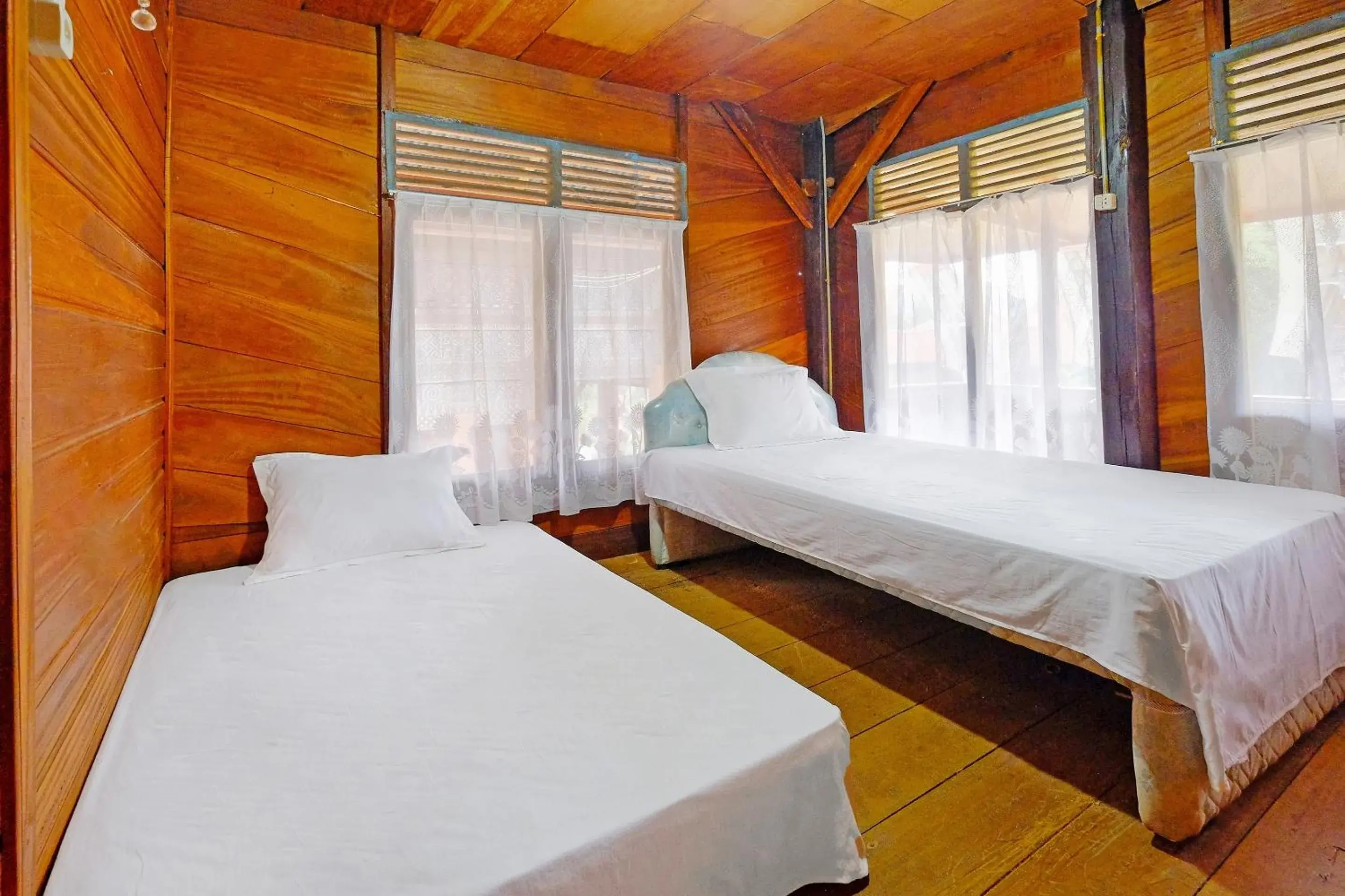 Bedroom in Hotel O Tatto Bara Homestay Near Tongkonan Payung Pangden Bedroom in Hotel O Tatto Bara Homestay Near Tongkonan Payung Pangden