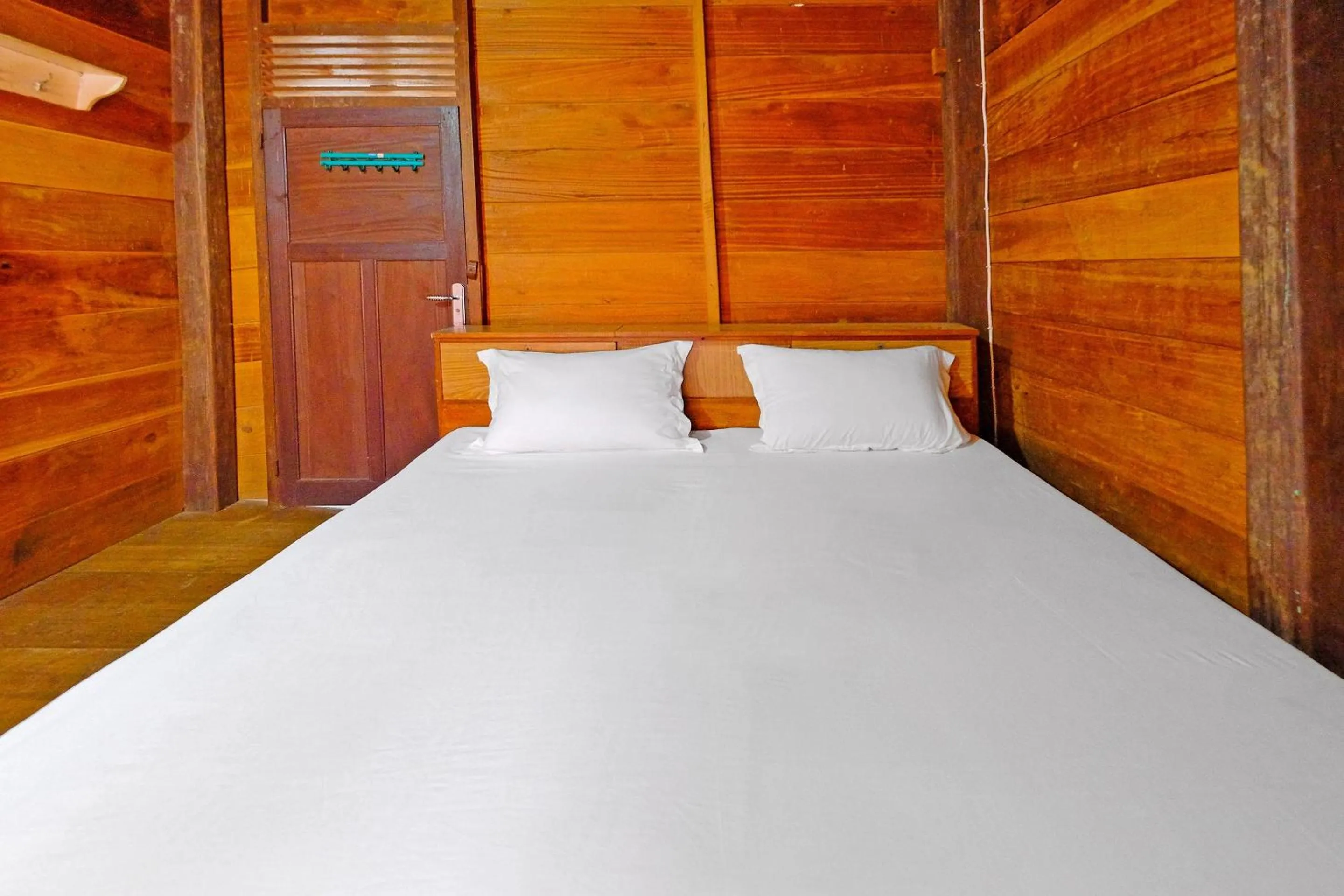 Bedroom, Bed in Hotel O Tatto Bara Homestay Near Tongkonan Payung Pangden