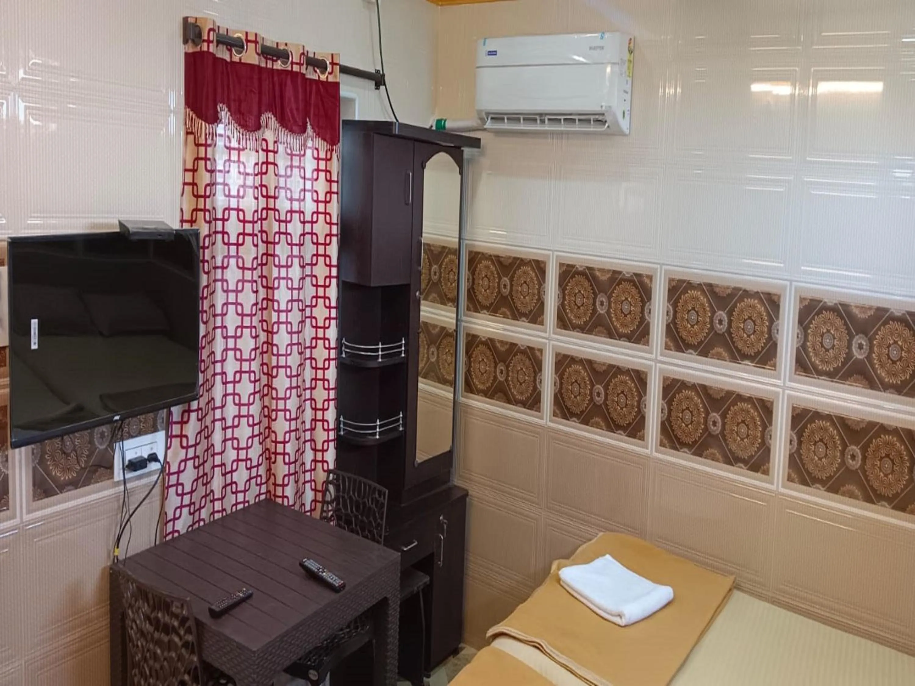 Bedroom in French Breeze Residency