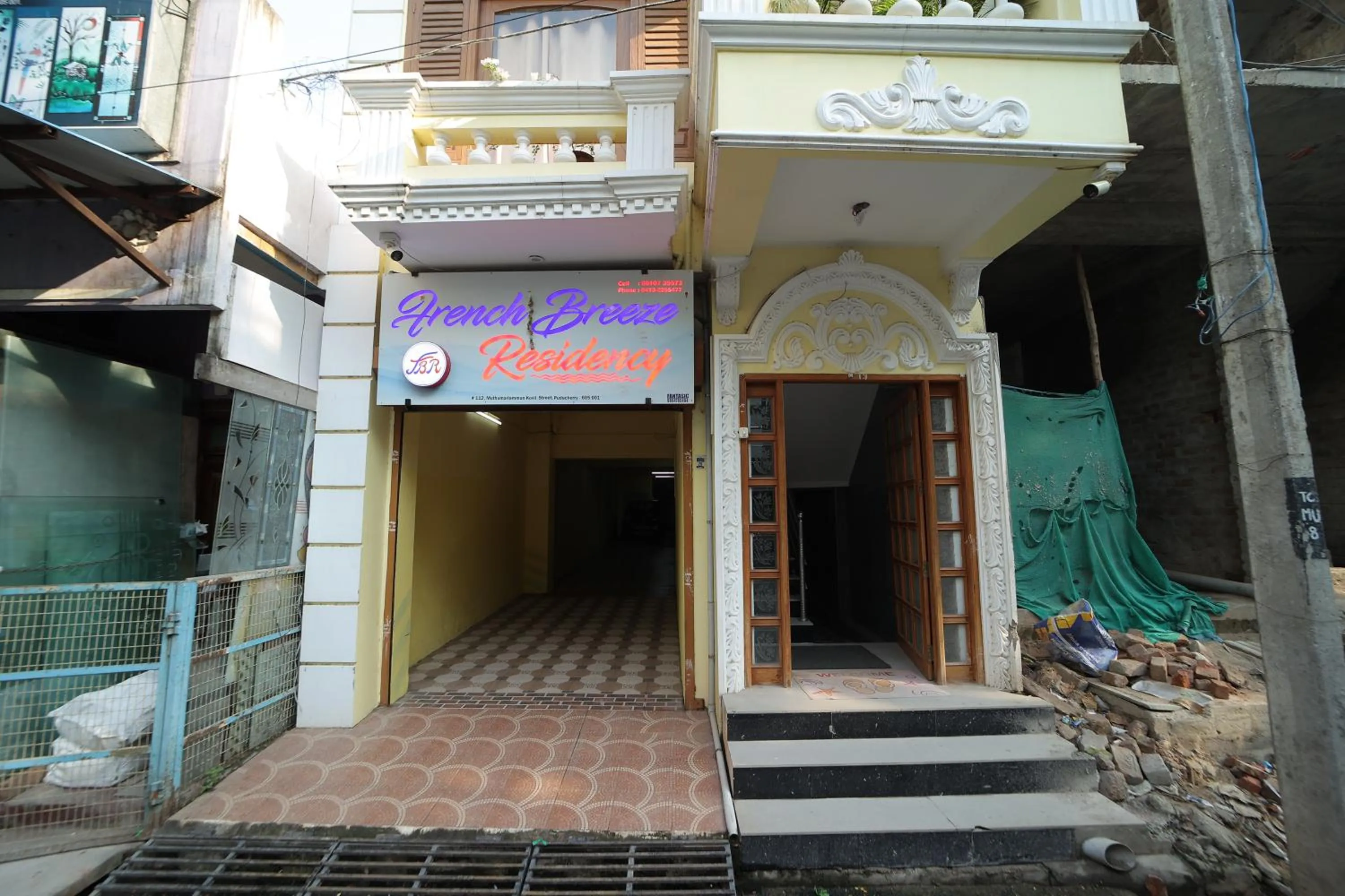 Facade/entrance in French Breeze Residency