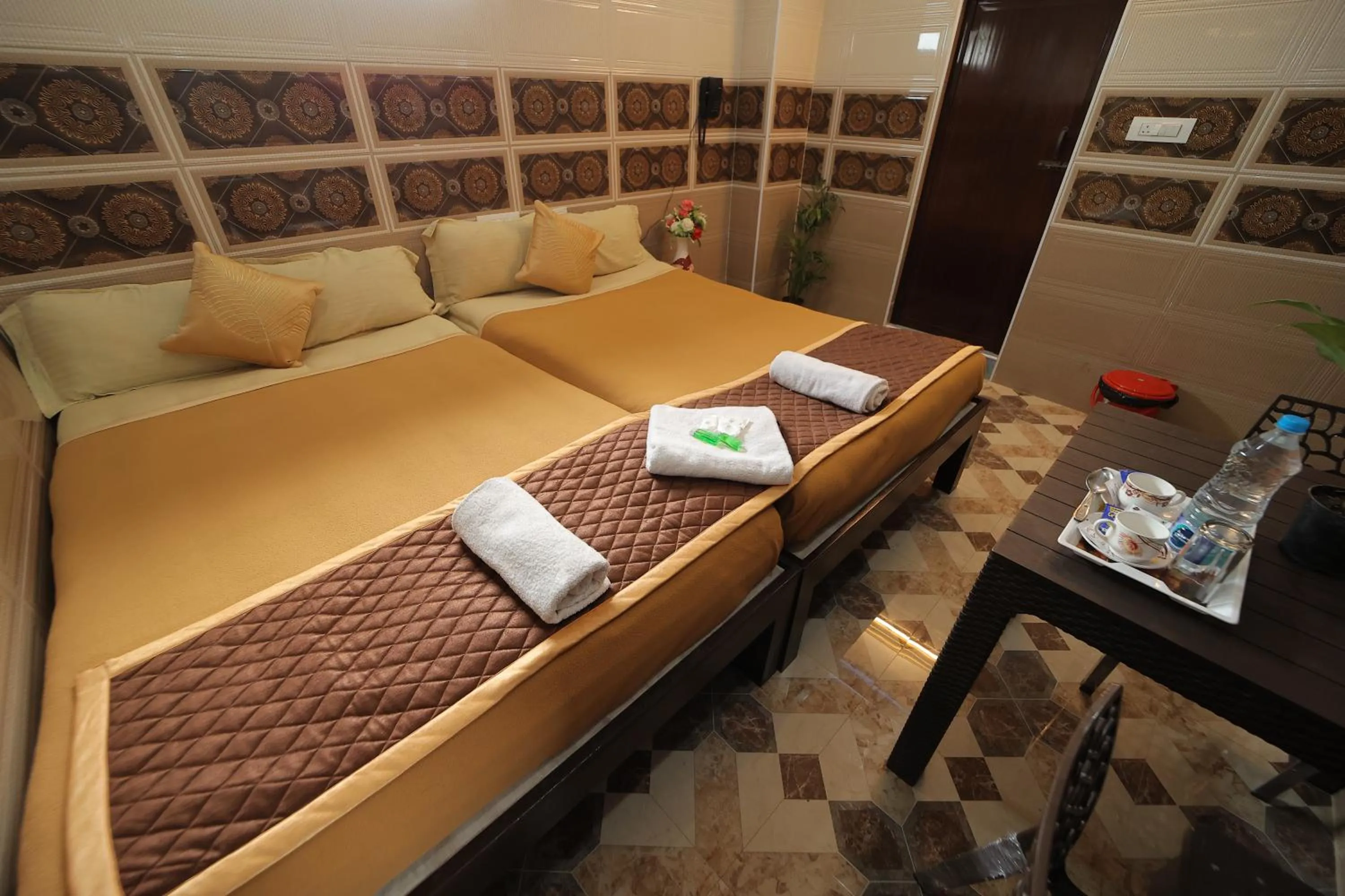 Bed in French Breeze Residency