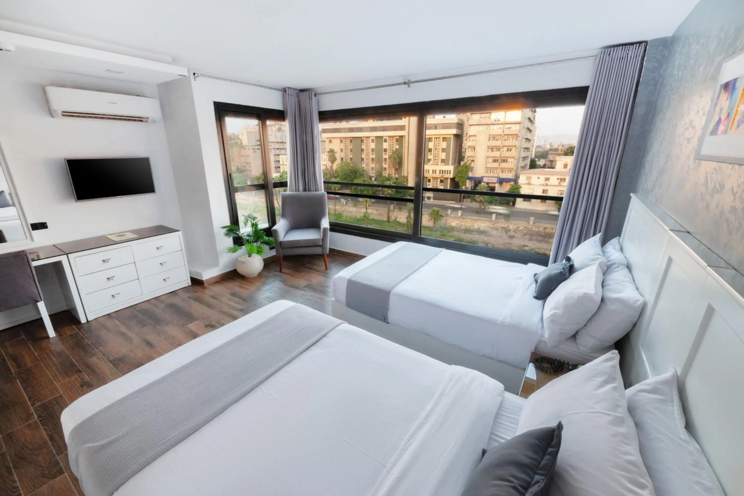 Communal lounge/ TV room in Nile Villa Hotel