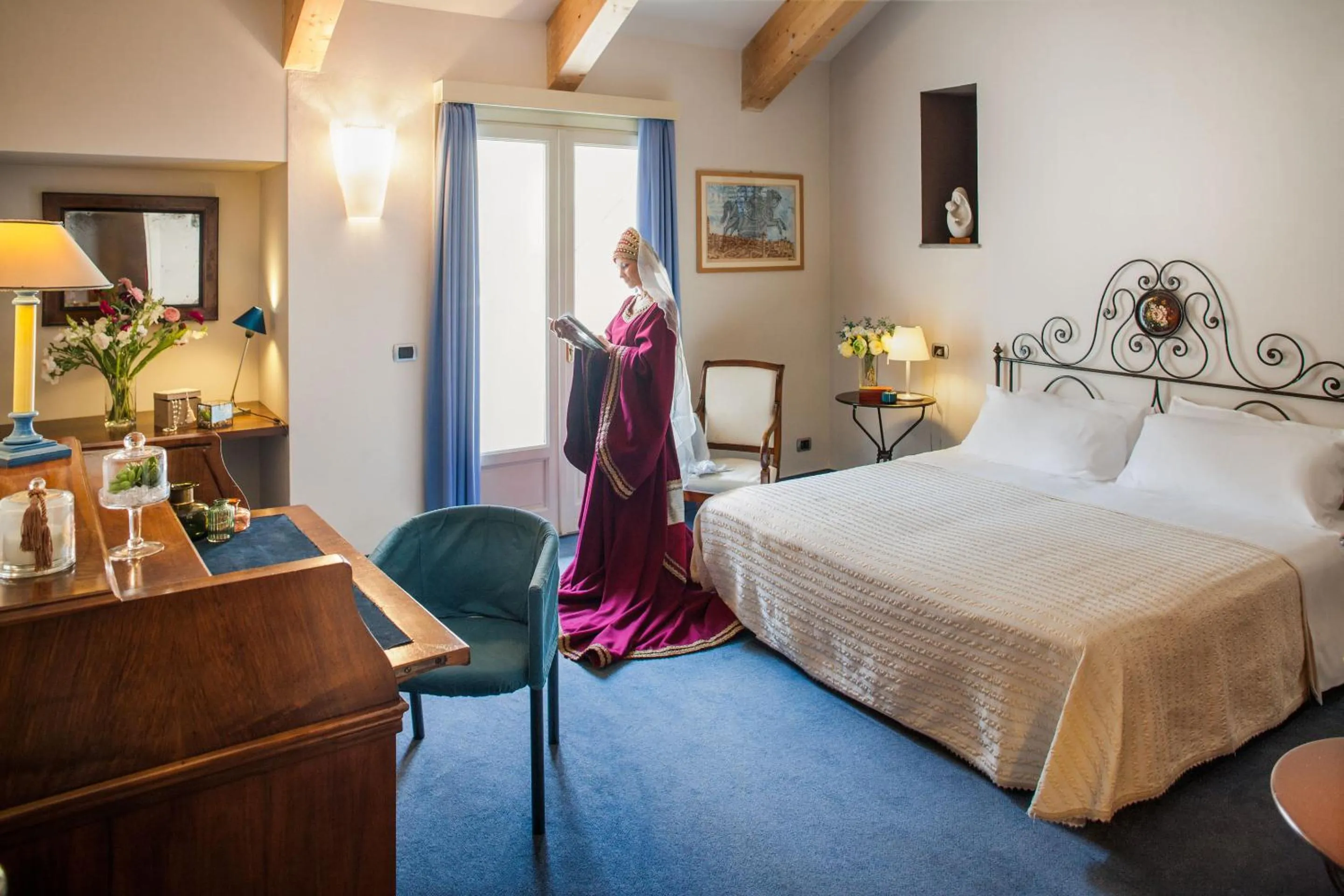 Bed in Phi Hotel Palio