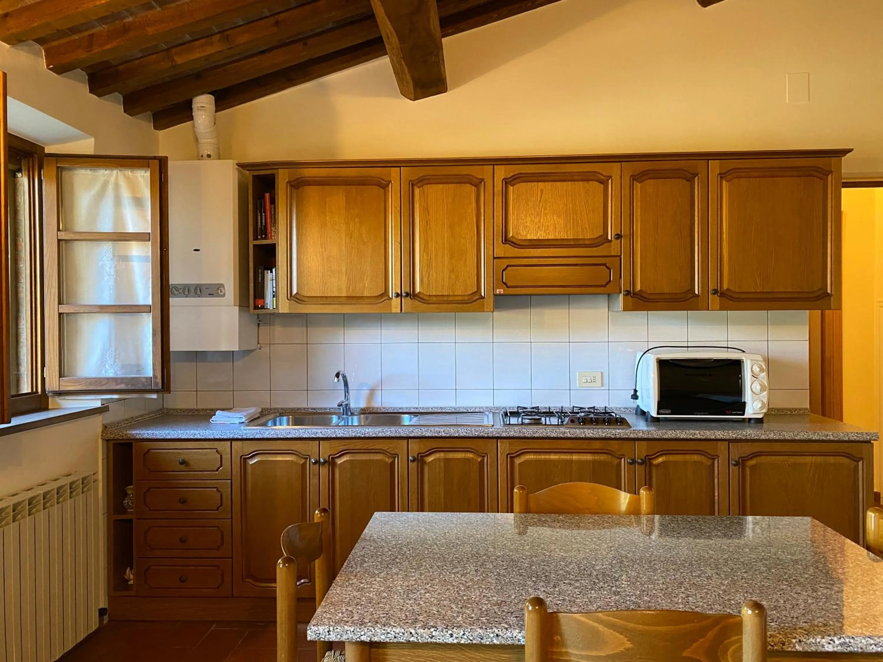Kitchen or kitchenette in Agriturismo Tenuta Badia