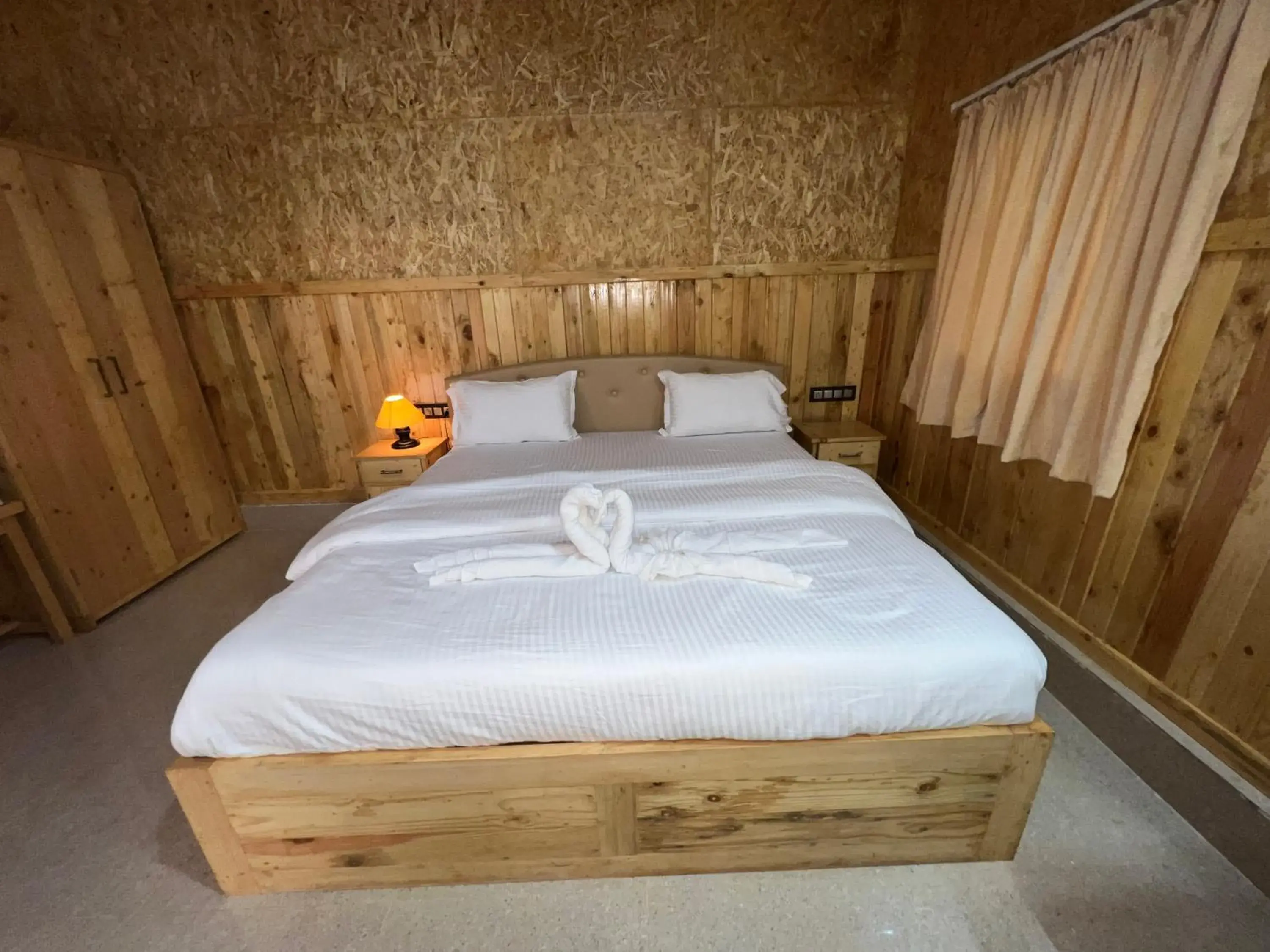 Bed in santanas wooden cottages Bed in santanas wooden cottages