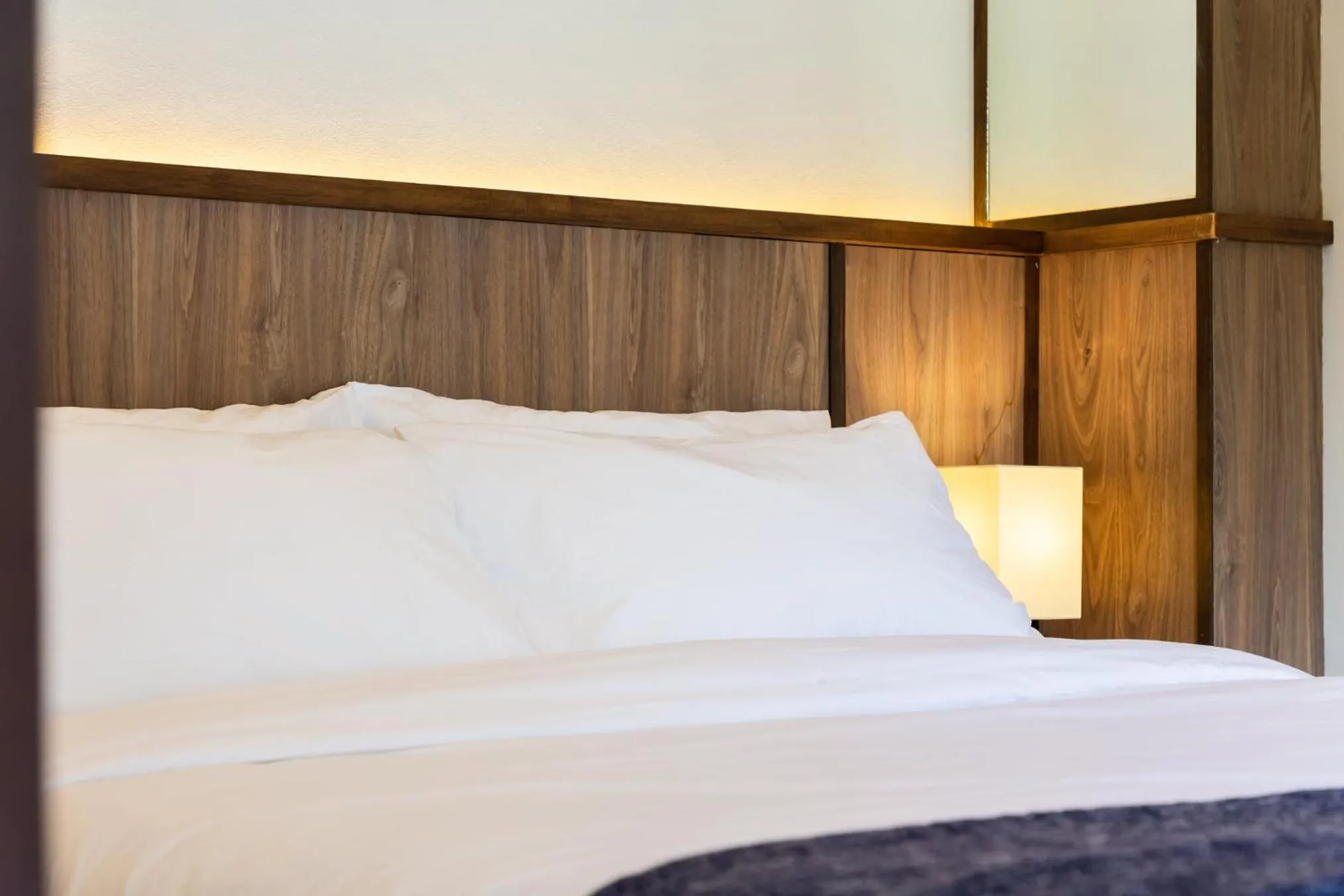 Bed in Baan Kamana Guest House