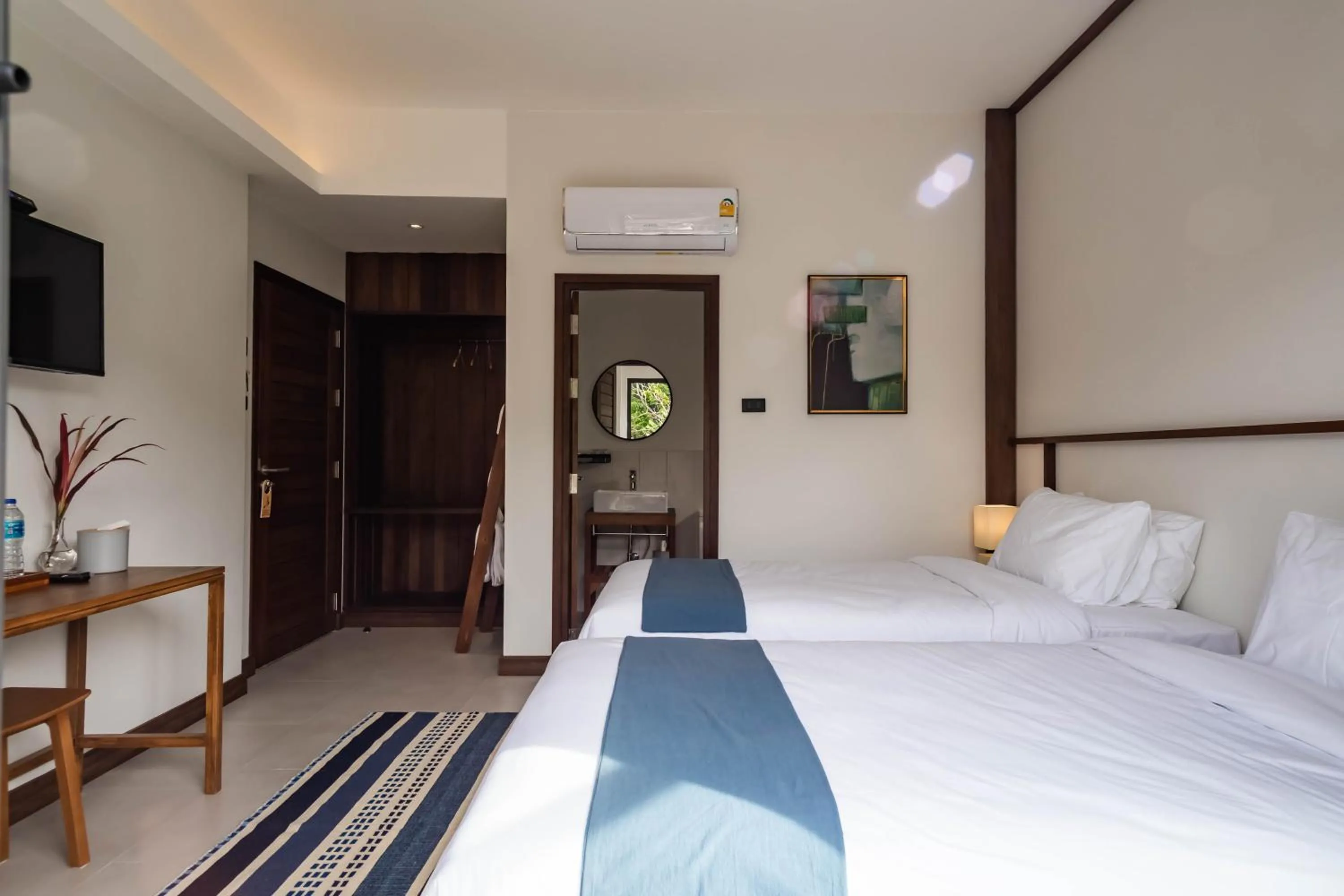 Bed in Baan Kamana Guest House