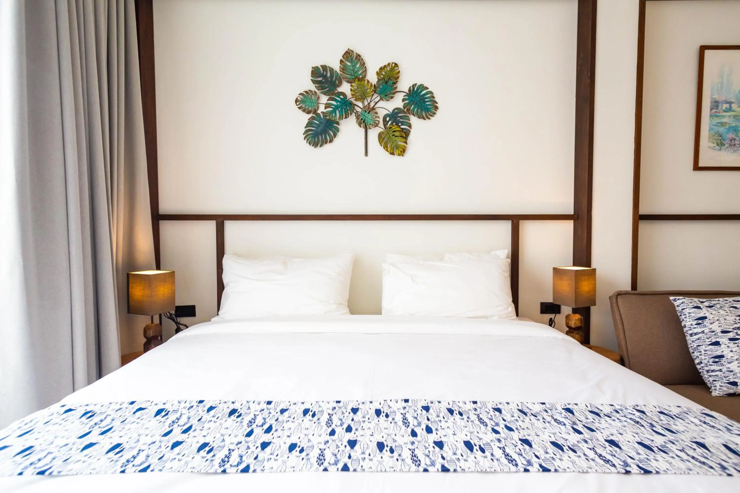 Bed in Baan Kamana Guest House