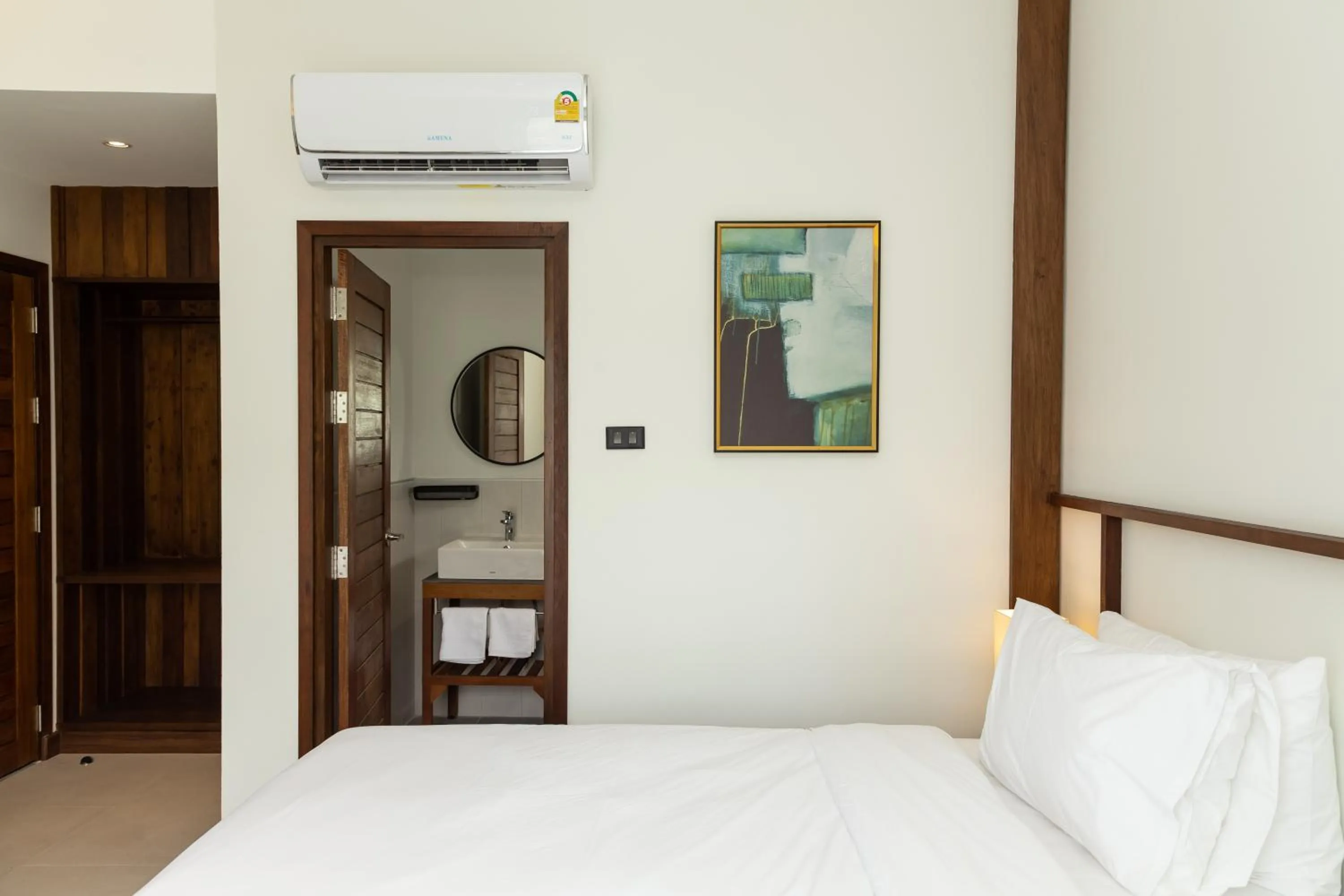 Bed in Baan Kamana Guest House