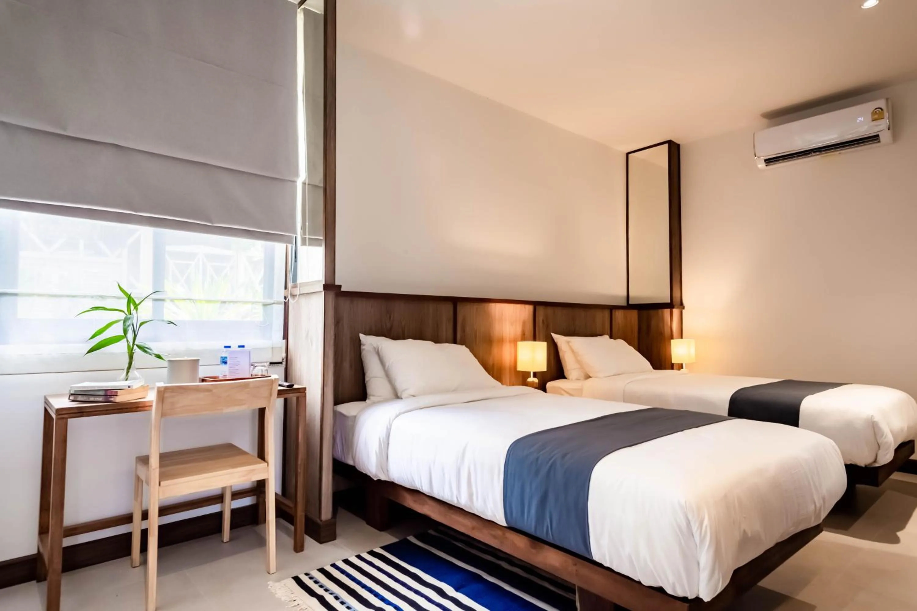 Bed in Baan Kamana Guest House