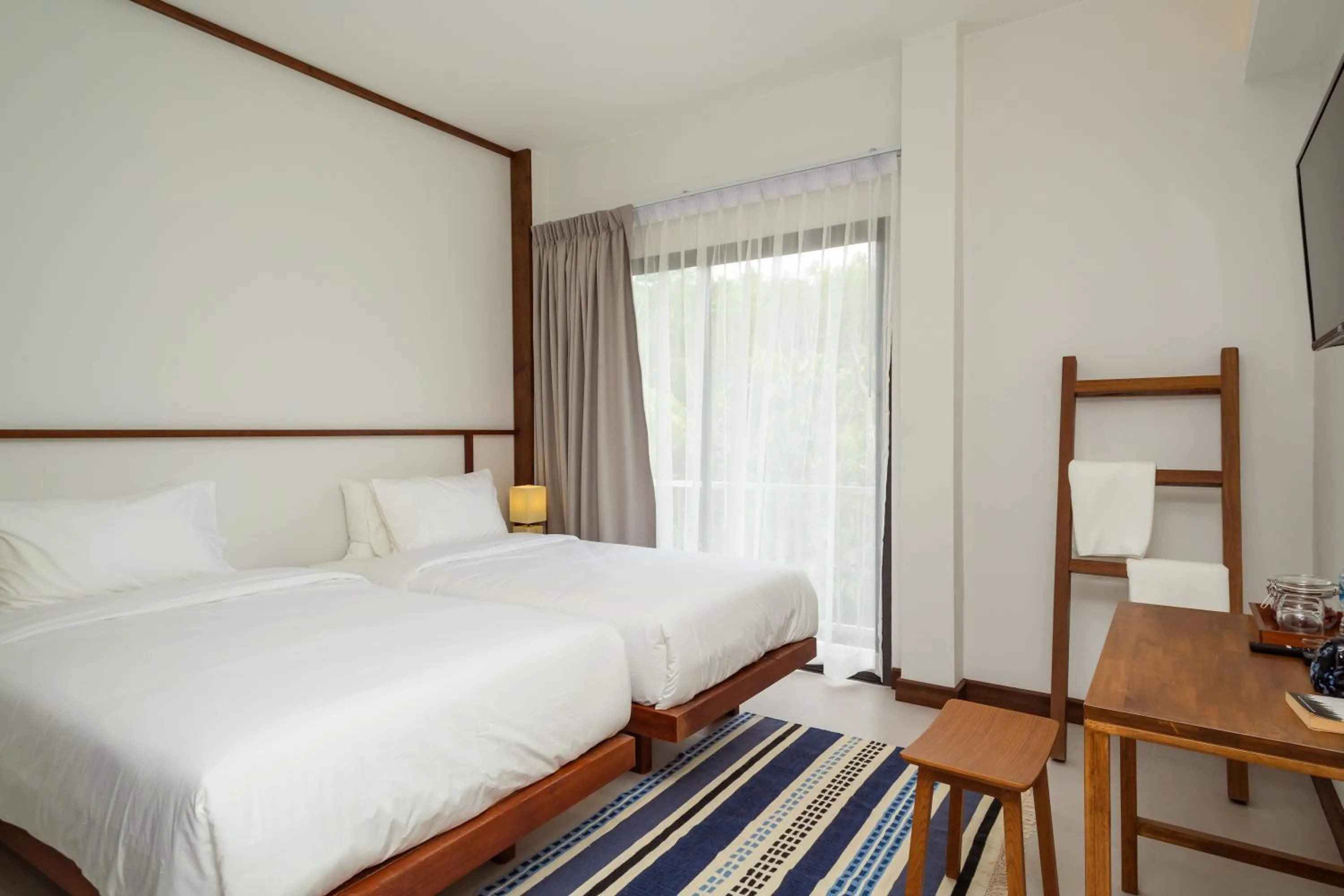 Bed in Baan Kamana Guest House