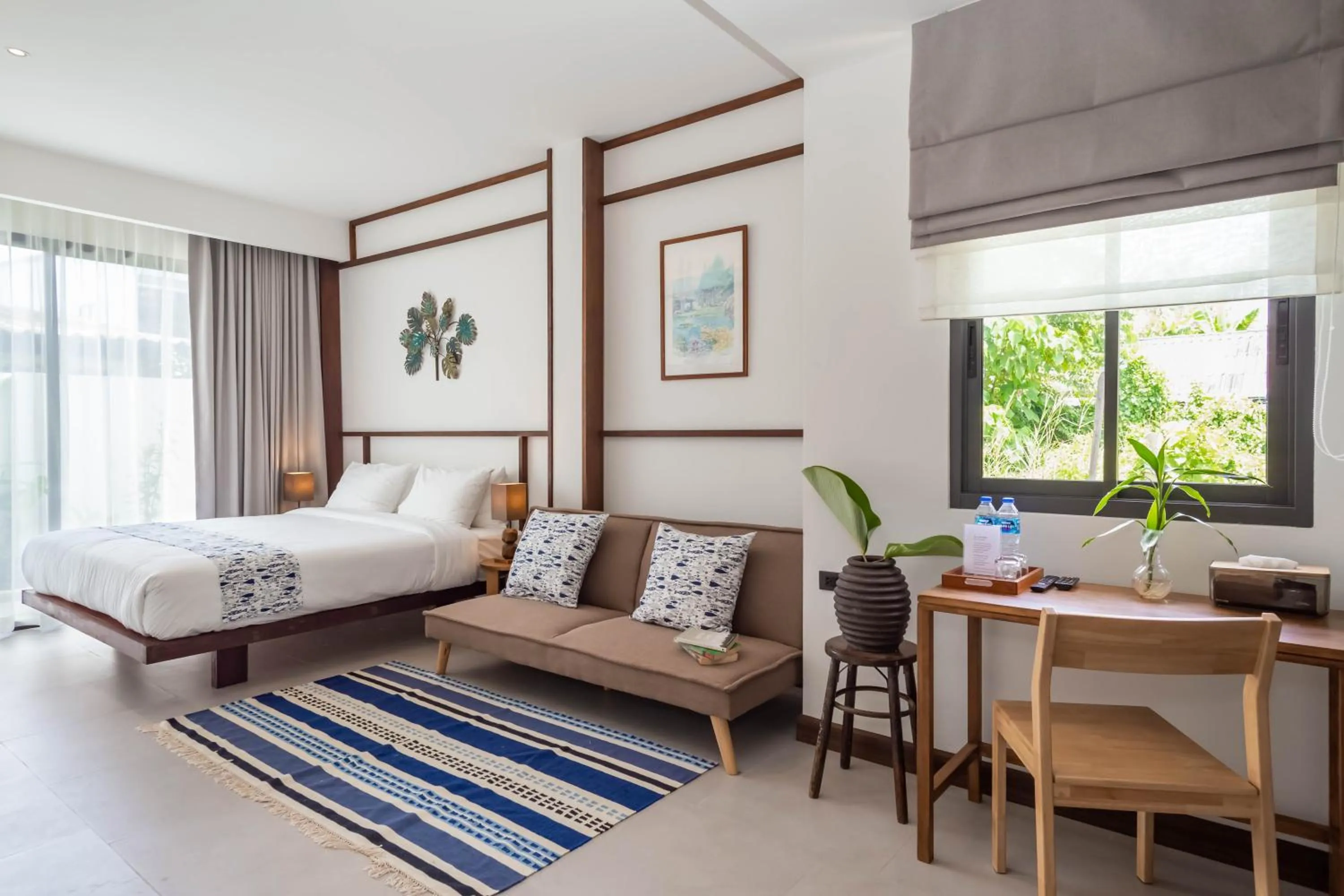 Bed in Baan Kamana Guest House