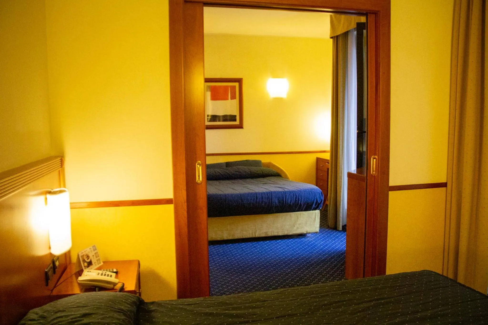 Bed in Pacific Hotel Fortino