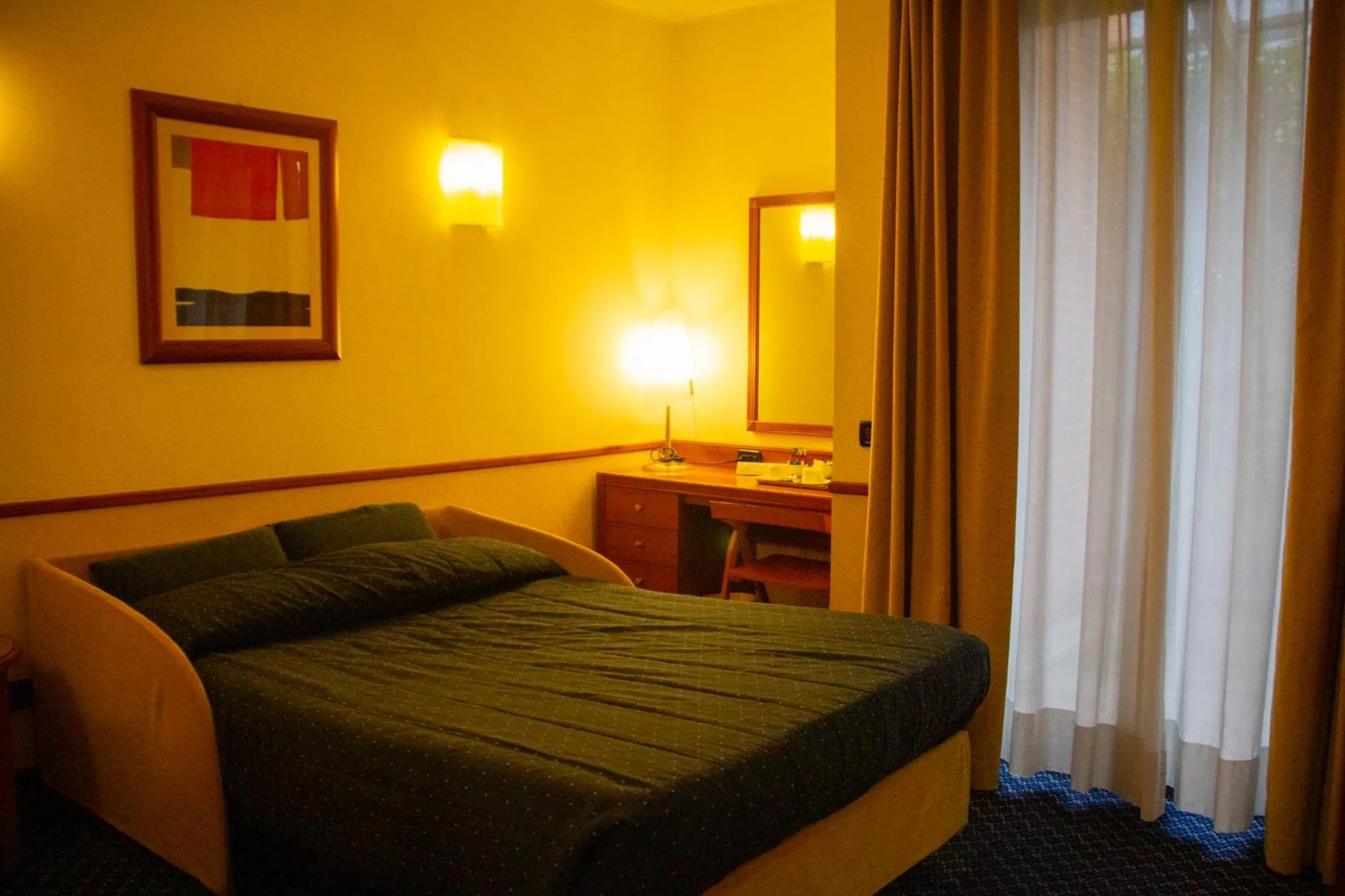 Bed in Pacific Hotel Fortino