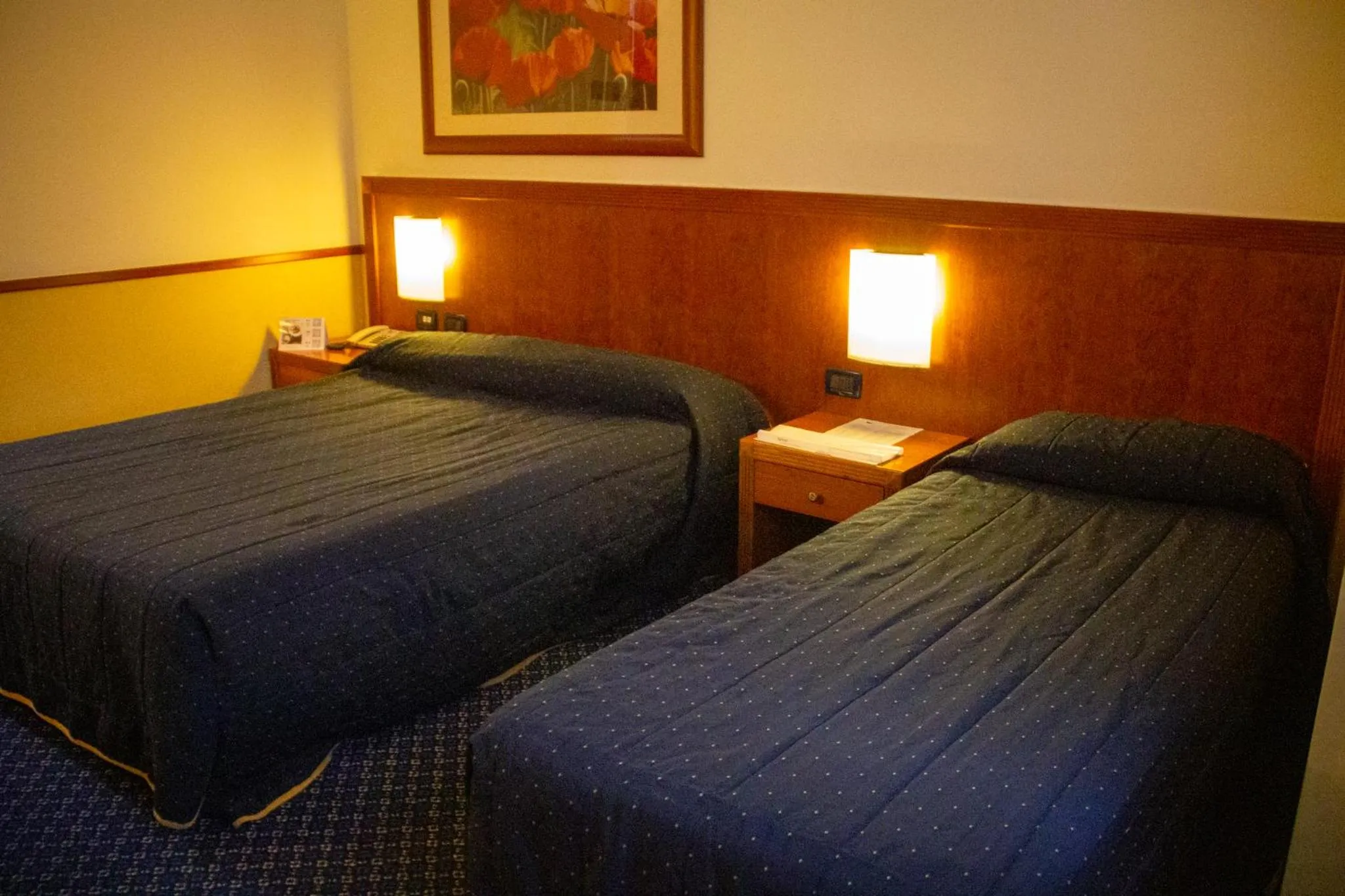 Bed in Pacific Hotel Fortino
