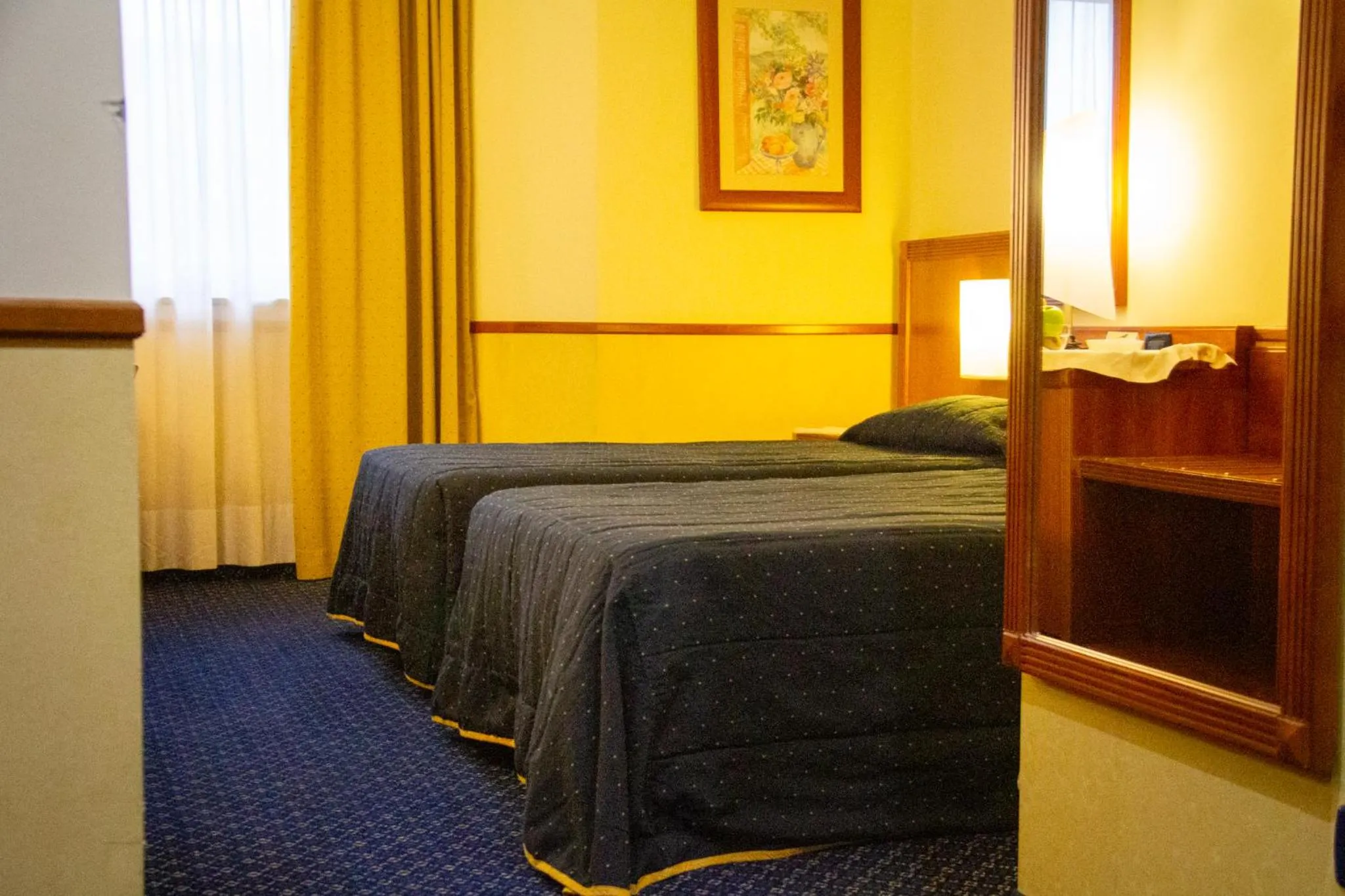 Bed in Pacific Hotel Fortino