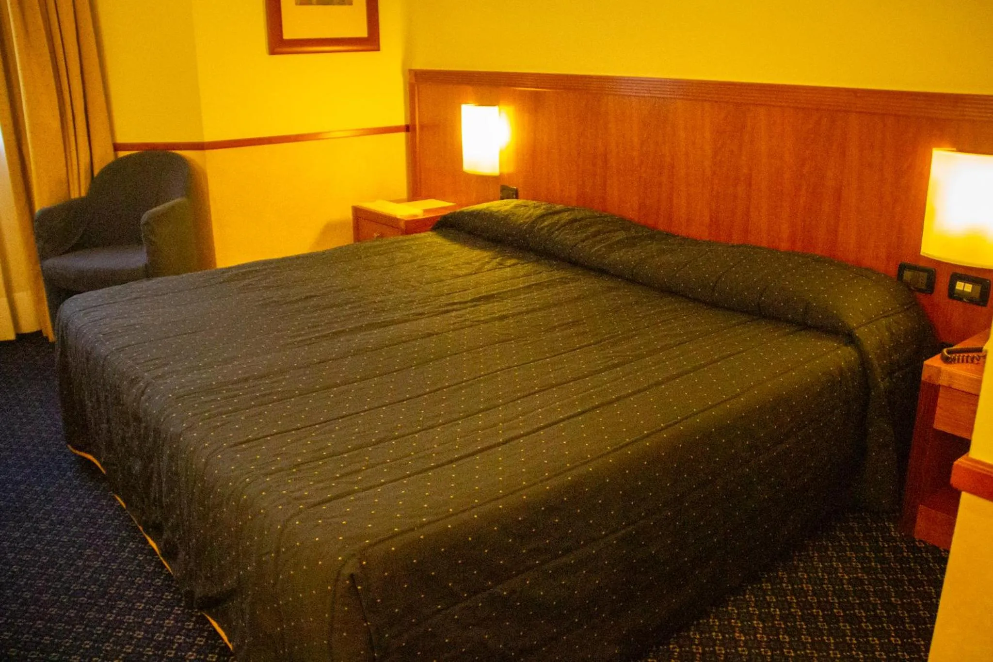 Bed in Pacific Hotel Fortino