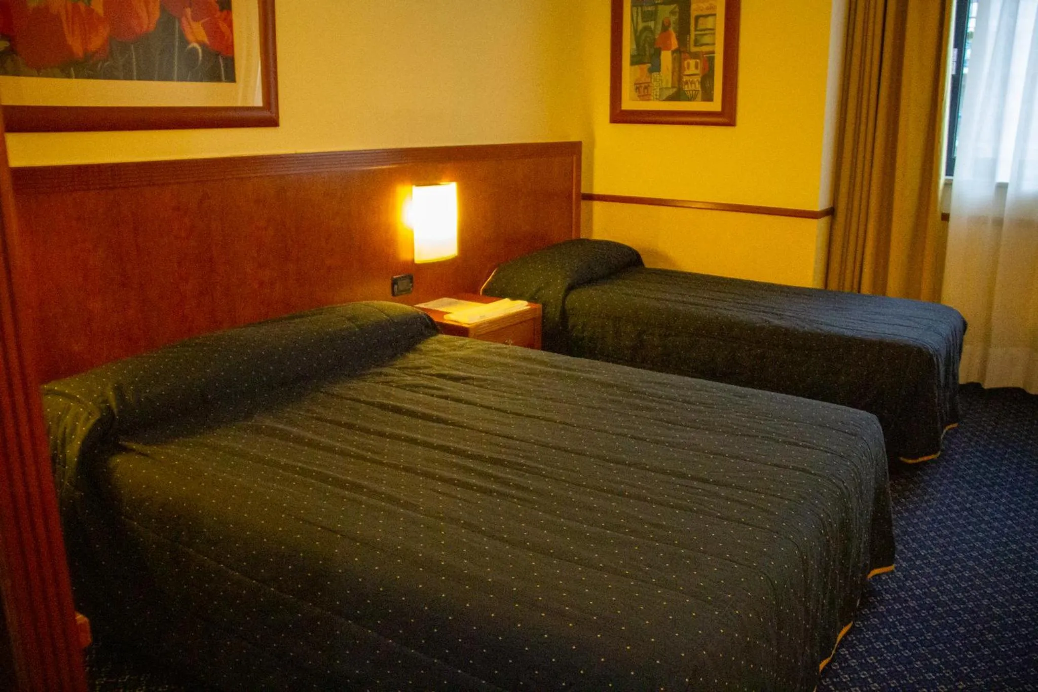 Bed in Pacific Hotel Fortino