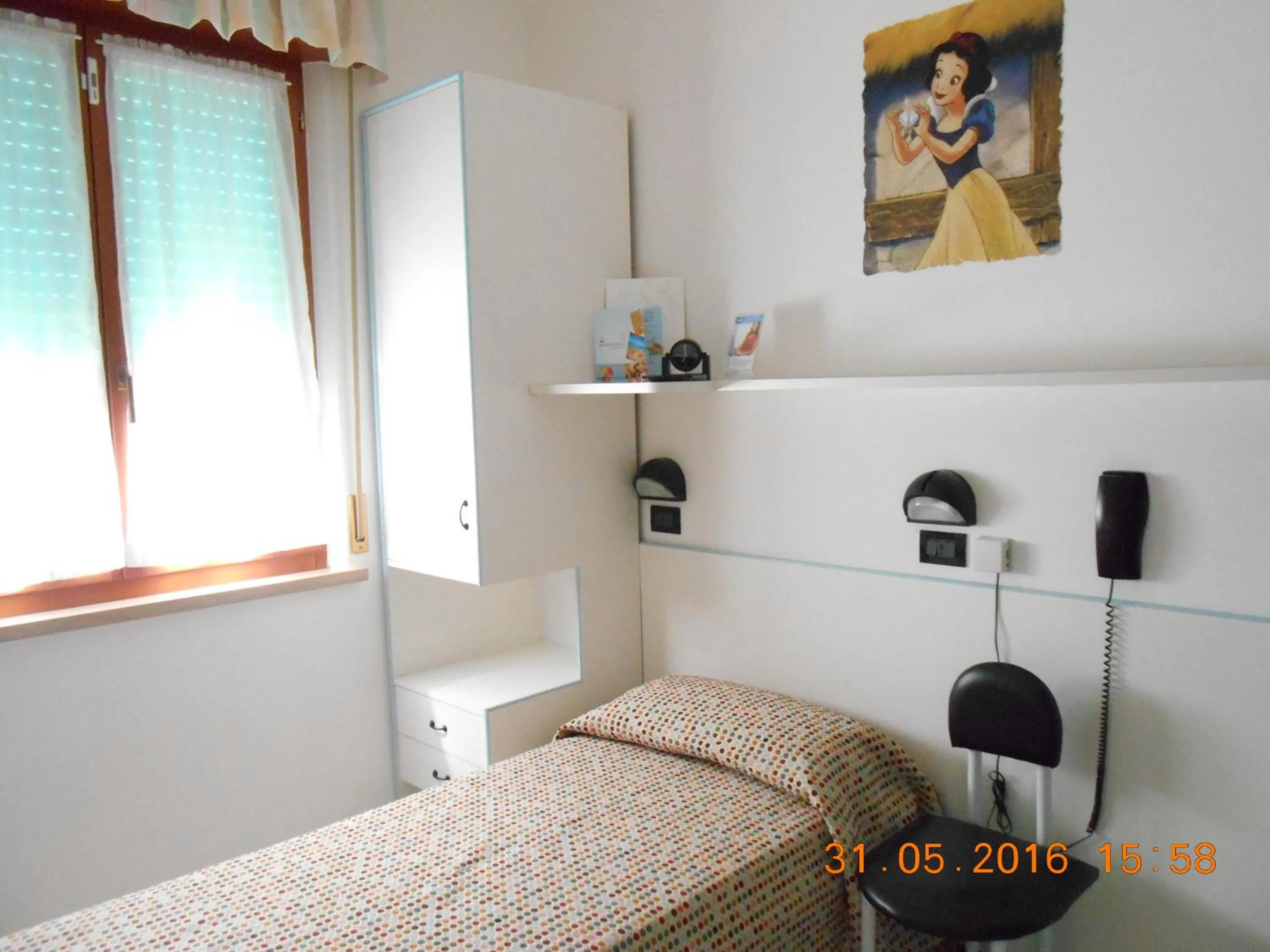 Bed in Hotel Biancaneve Wellness