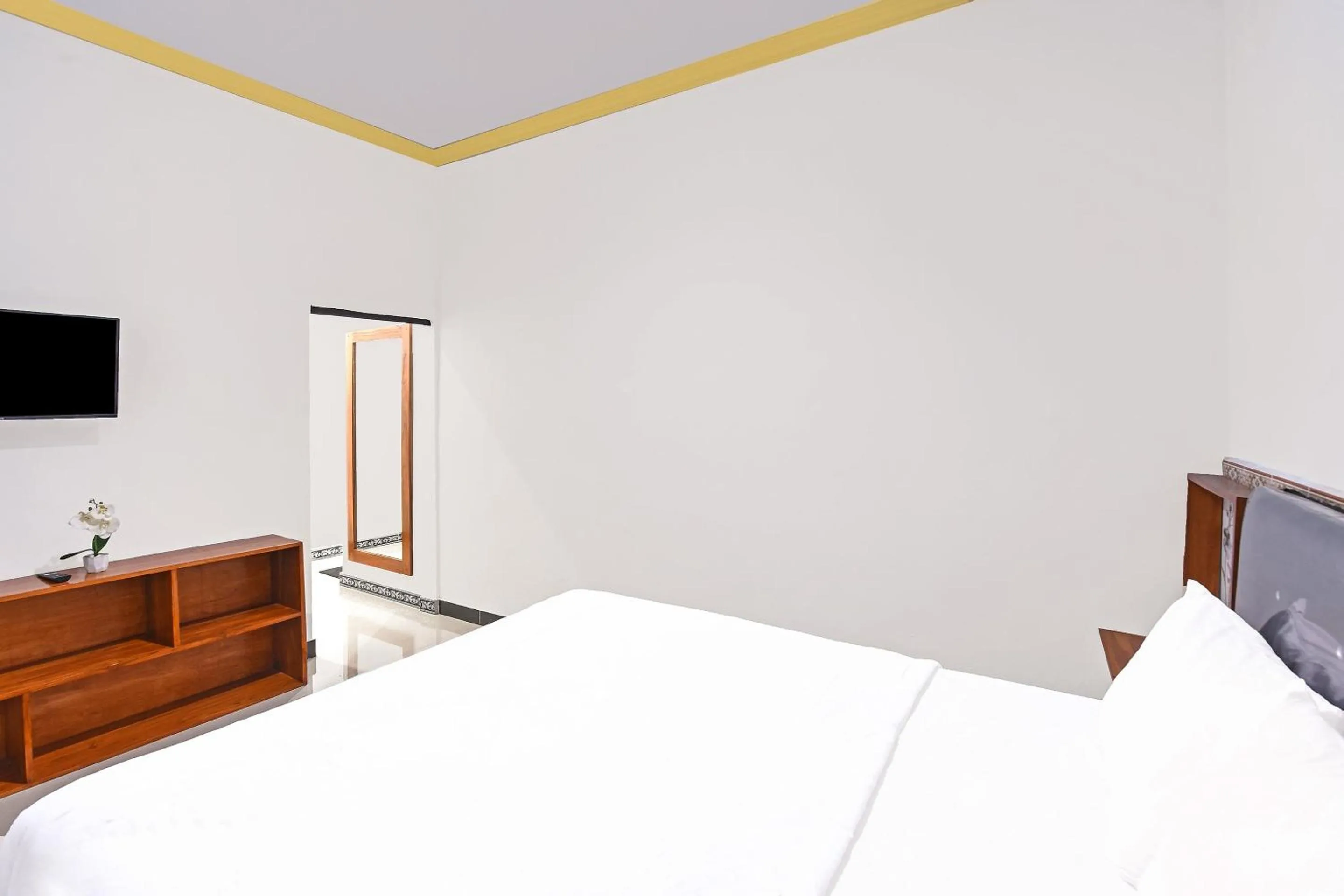 Bedroom, Bed in Hotel O Homestay Antara