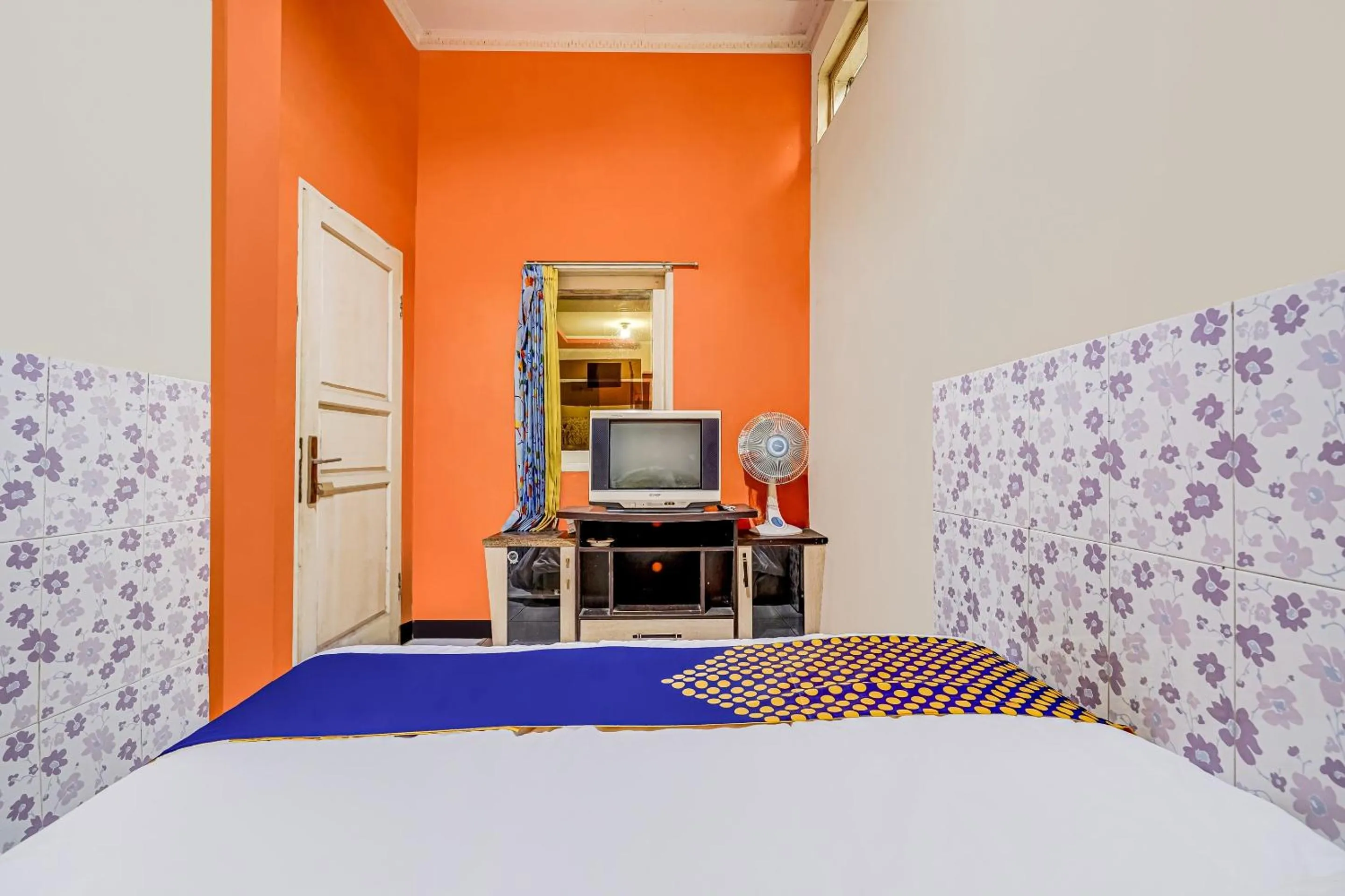 Bedroom in SPOT ON 91186 Losmen Yanti