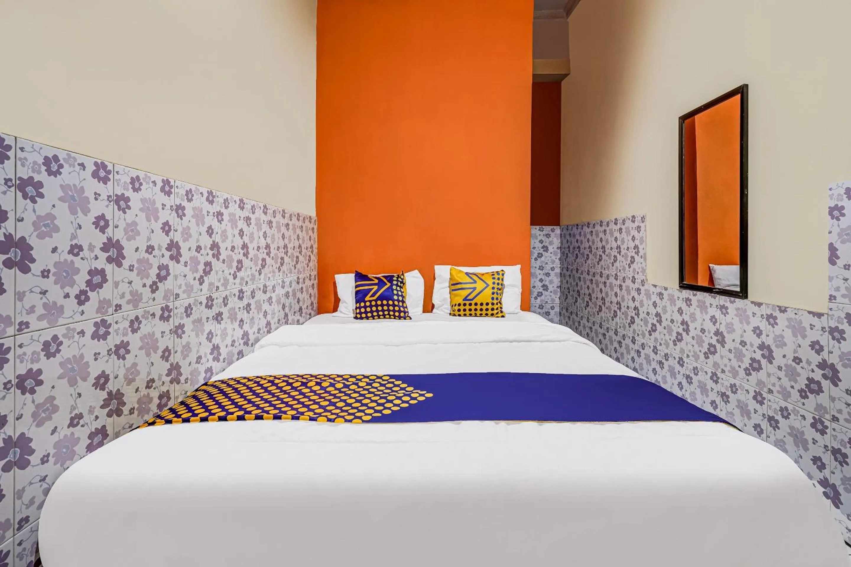 Bedroom in SPOT ON 91186 Losmen Yanti