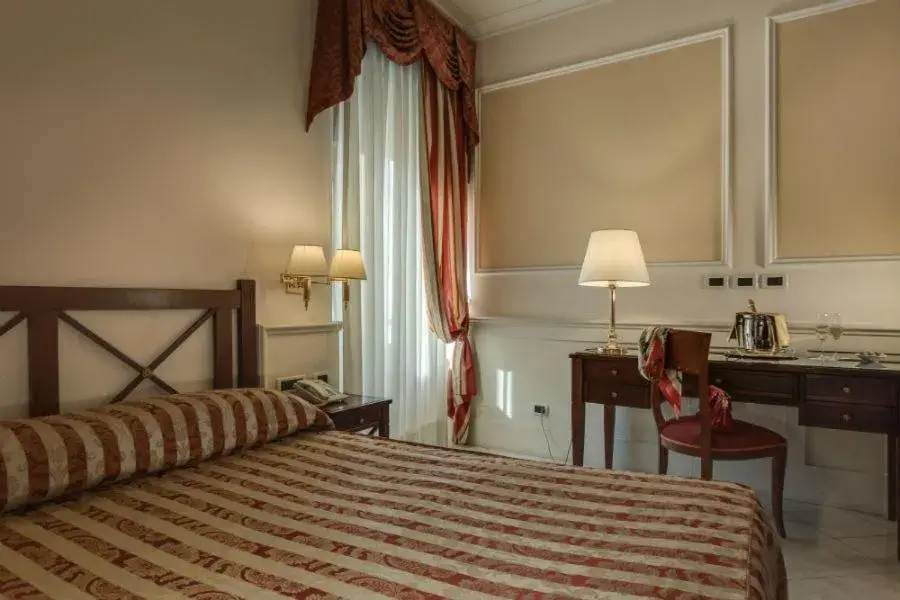 Bed in Palazzo Cardinal Cesi Bed in Palazzo Cardinal Cesi