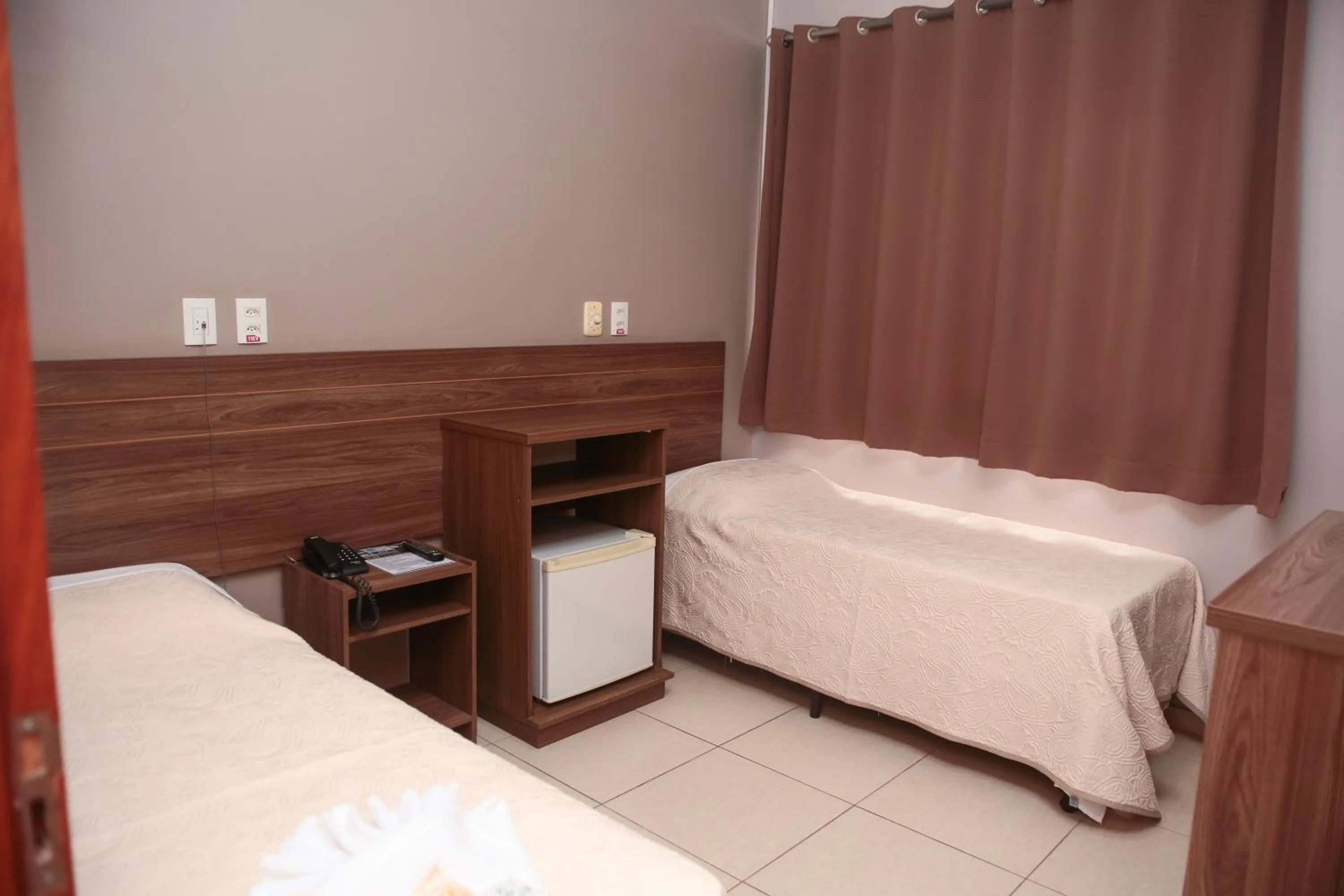 Bed in CAMBRAIA HOTEL ARCOS