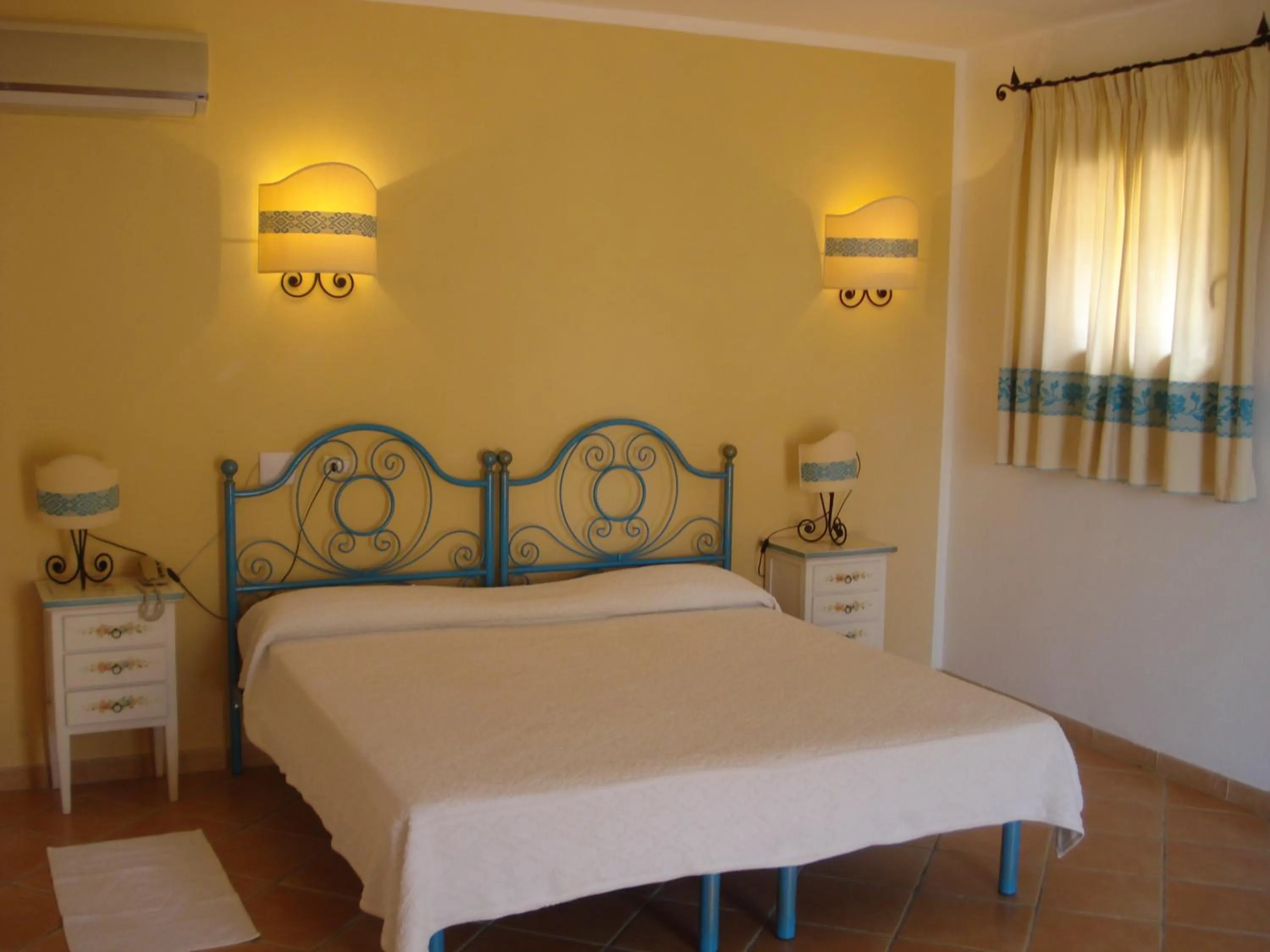 Bed in Hotel Valkarana Country Relais