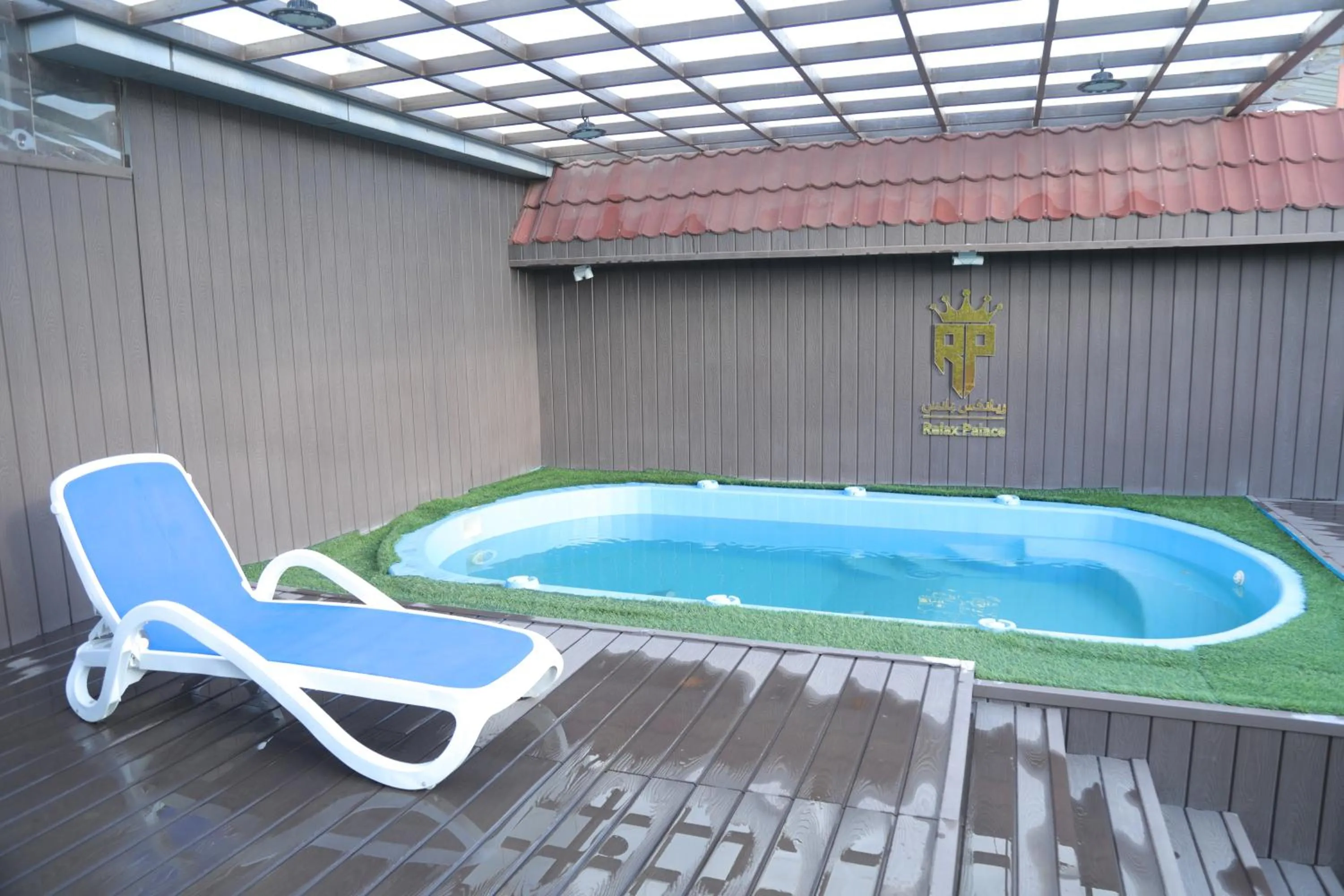 Swimming pool in Relax Palace Hotel Apartments