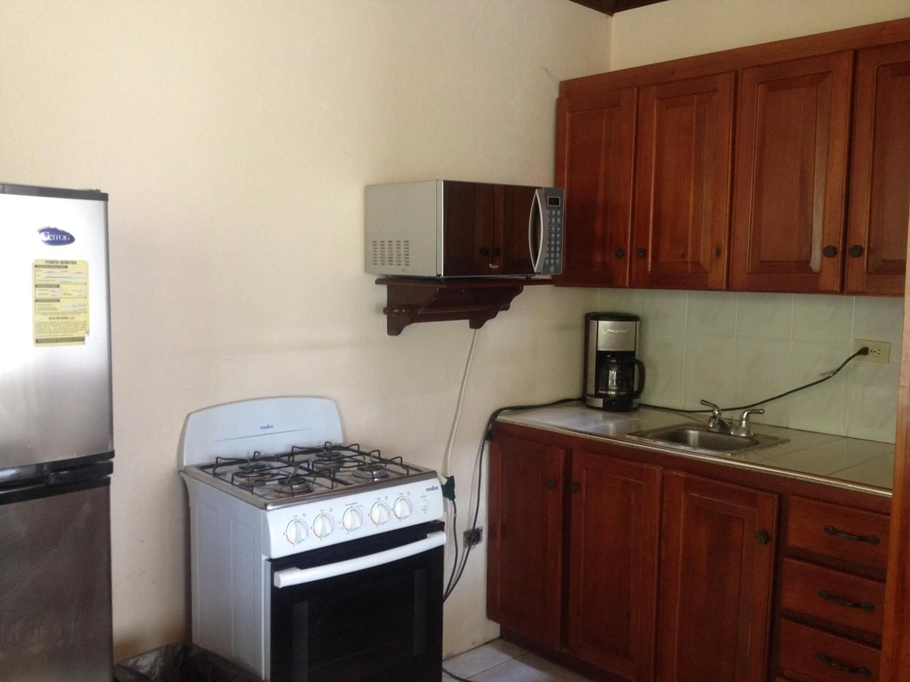 Kitchen or kitchenette in Fosters West Bay Resort