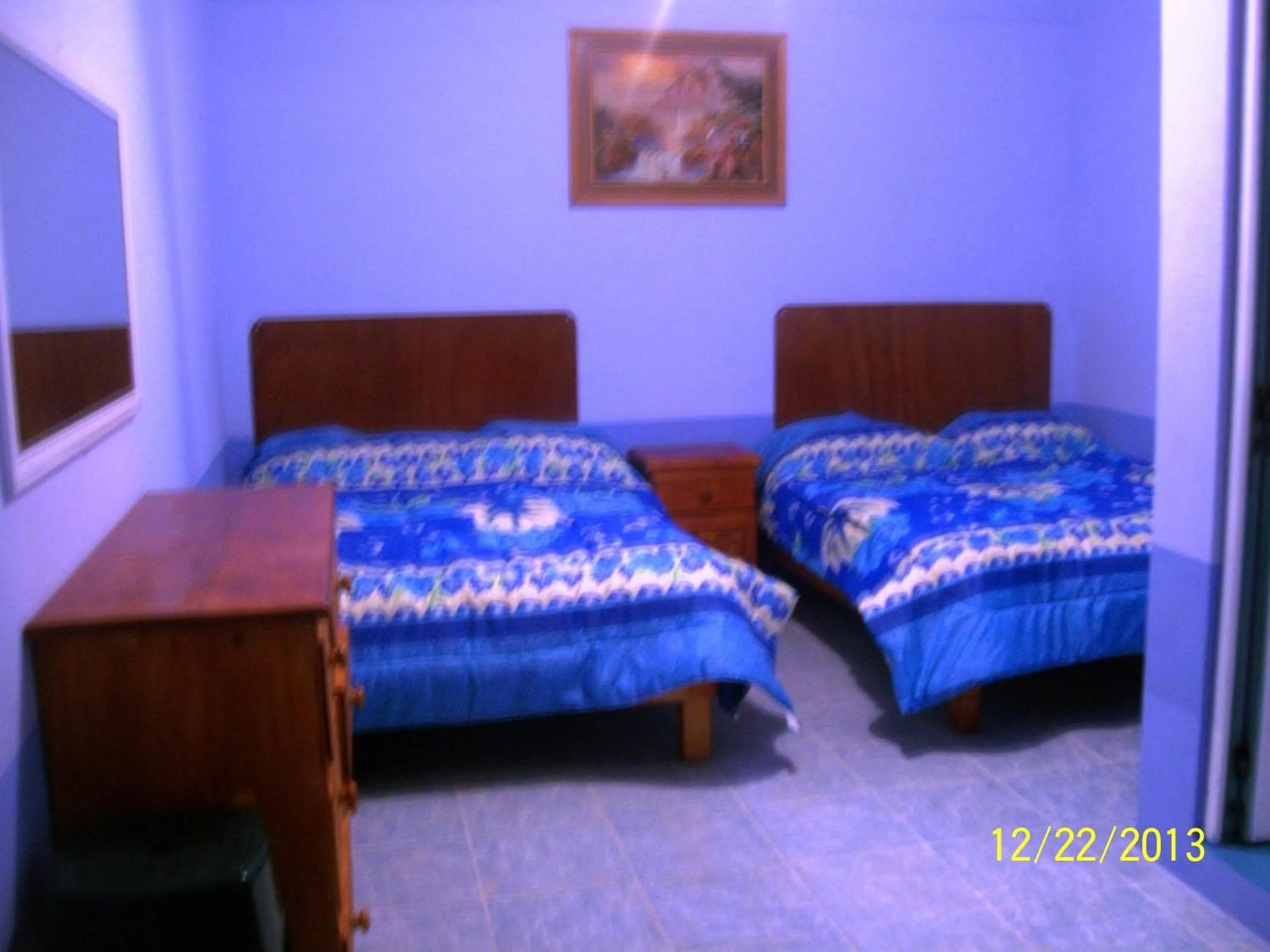 Bed in Hostal Eclipse Oaxaca