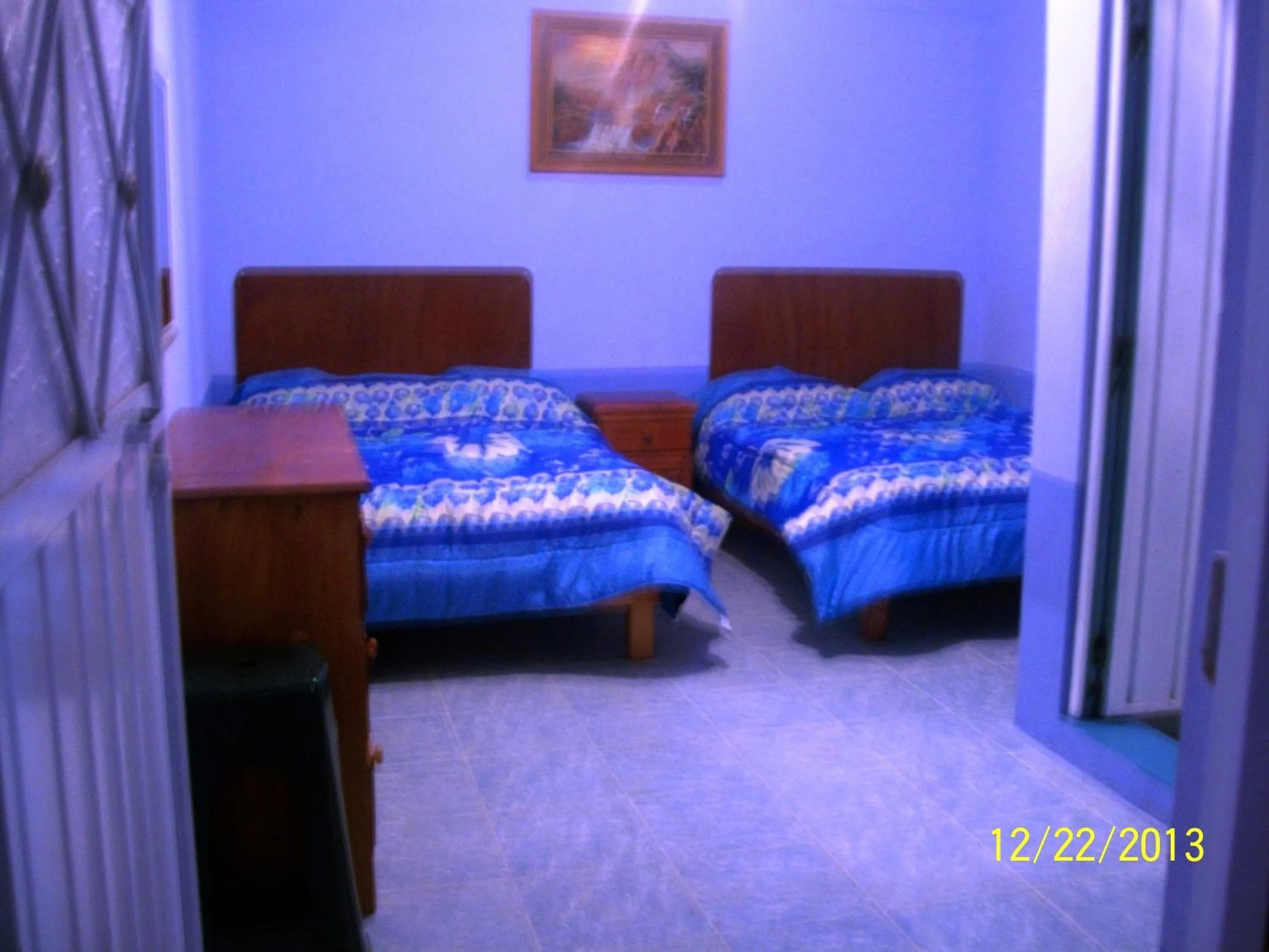 Bed in Hostal Eclipse Oaxaca