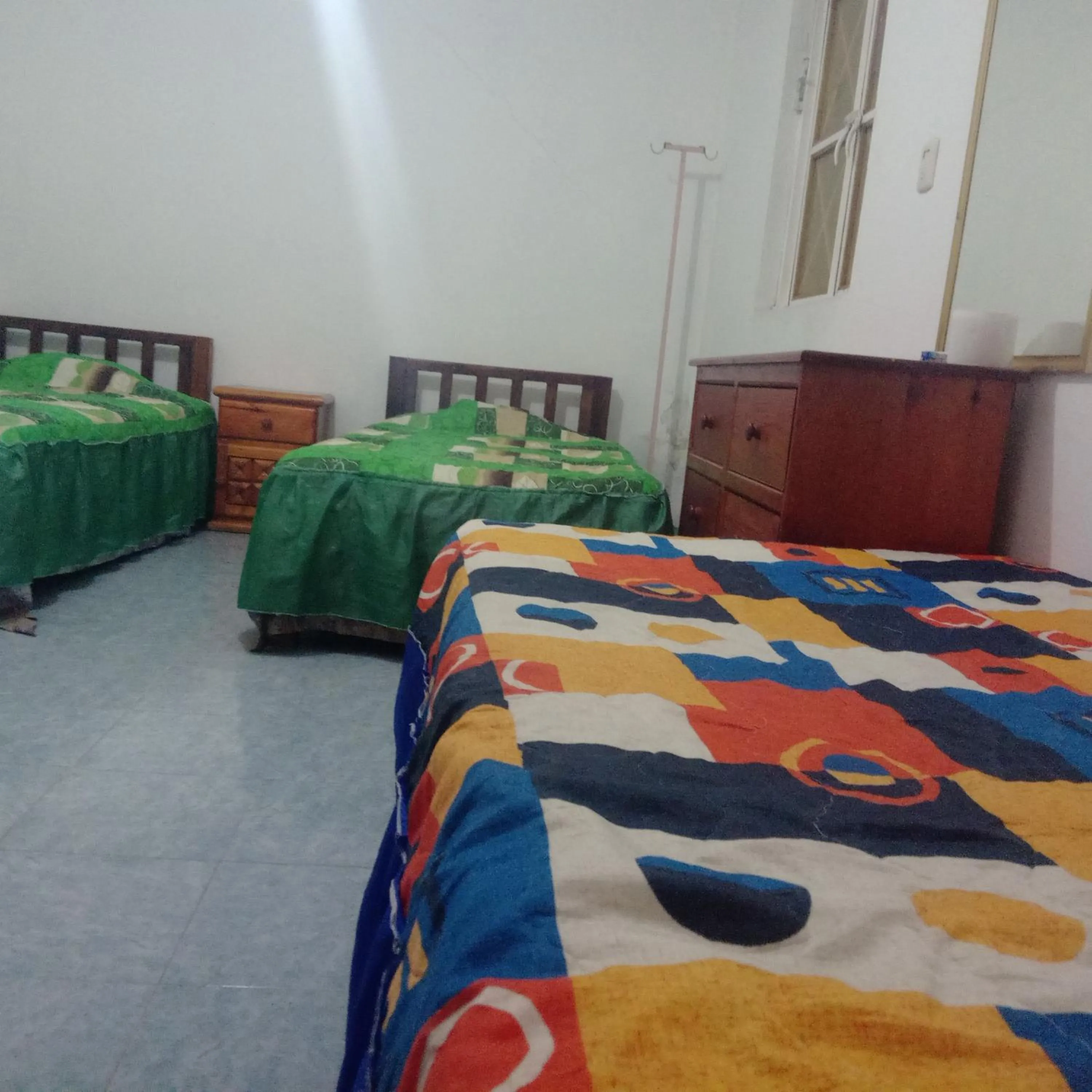 Bed in Hostal Eclipse Oaxaca