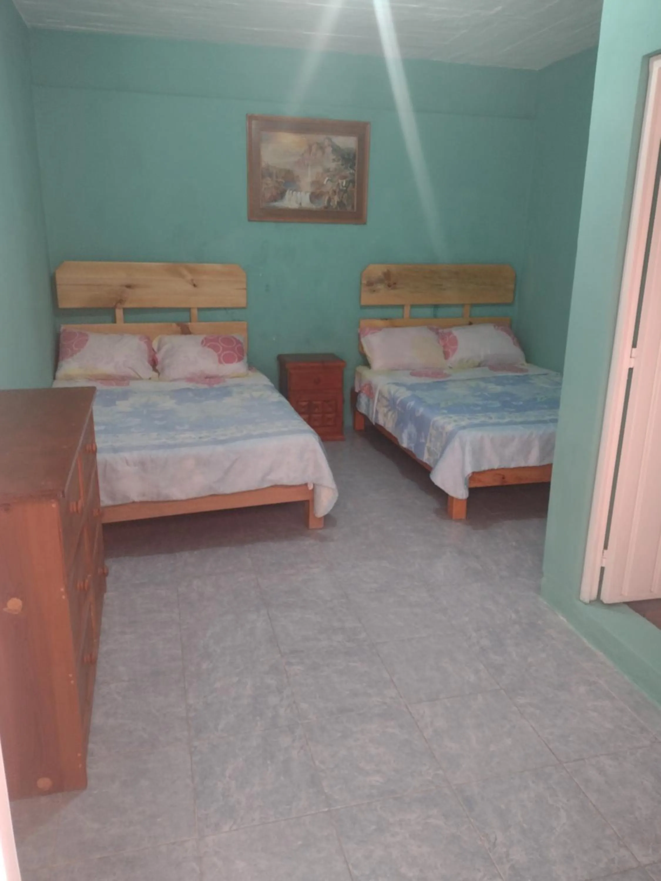 Bed in Hostal Eclipse Oaxaca