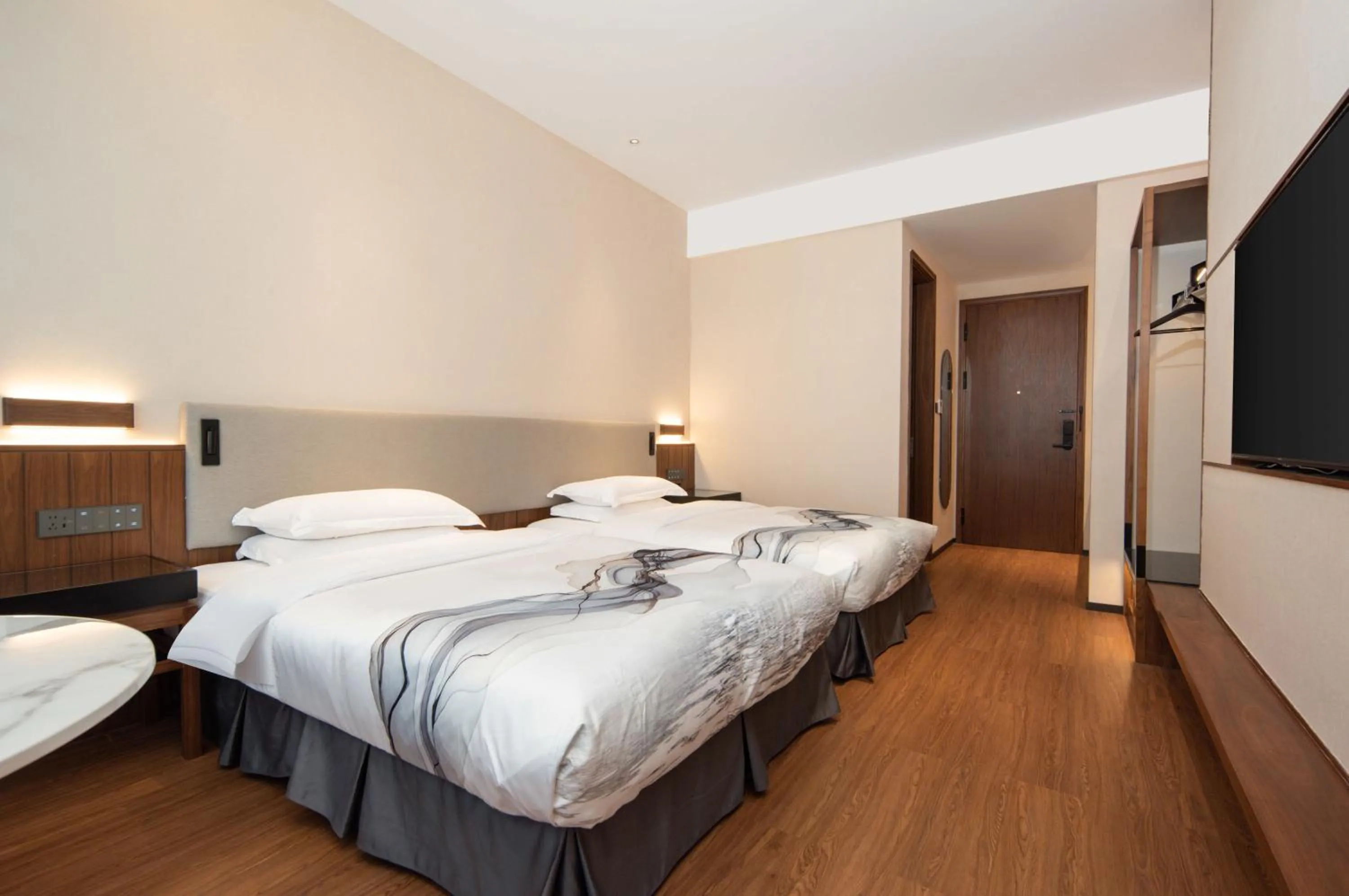 Bed in Huama SSAW Hotel Lijiang