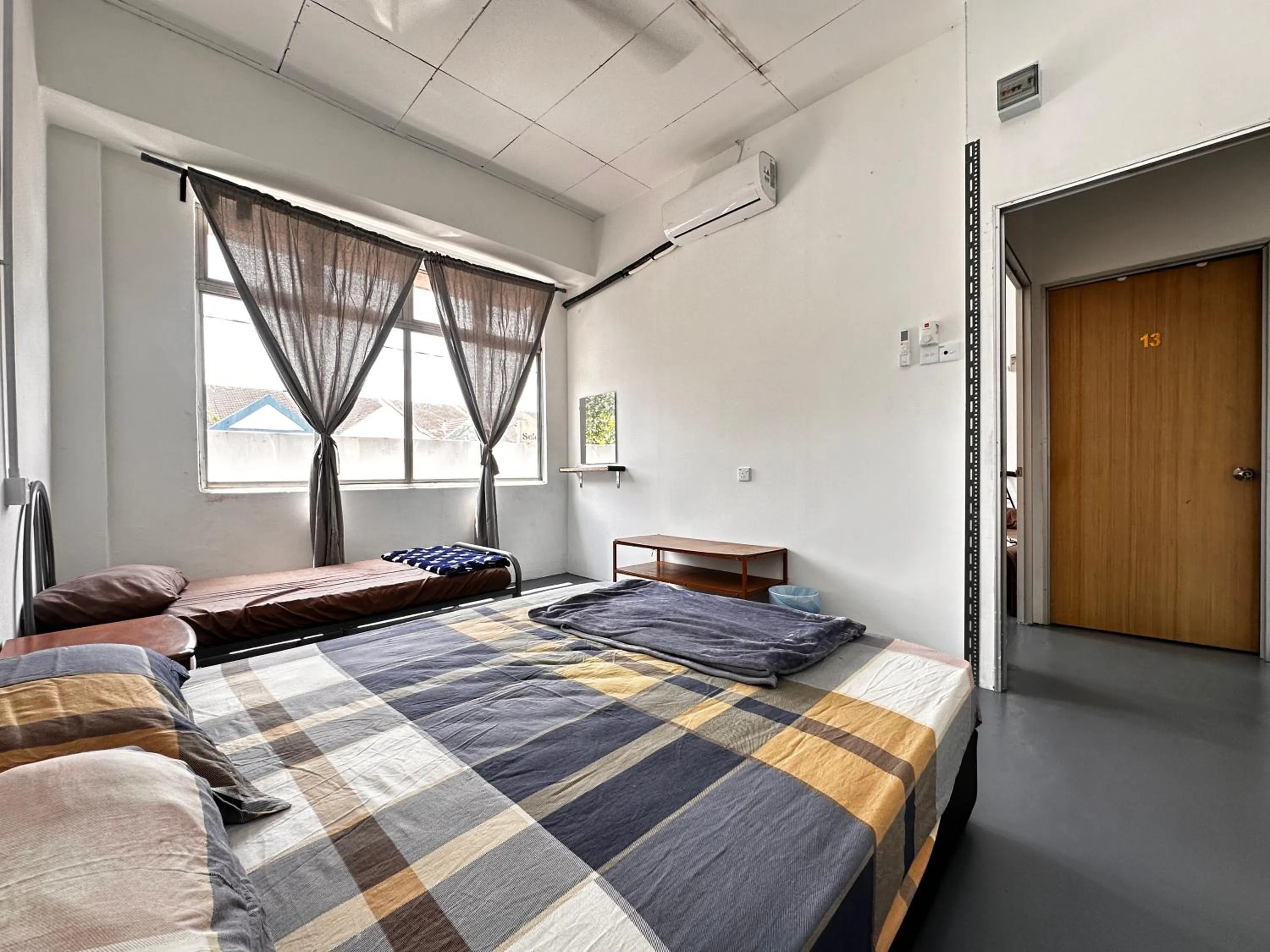 Bed in Jiaxin Dormitory - Puteri Wangsa 家馨旅舍