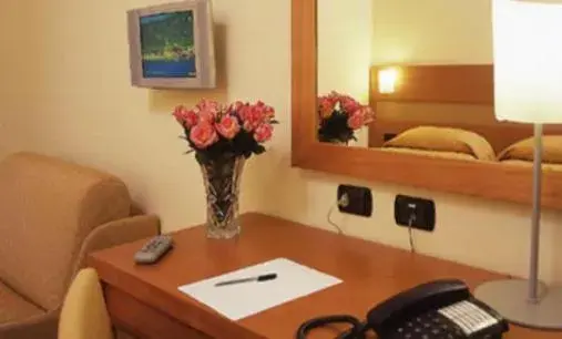 Seating area, Bed in Hotel Moscatello Seating area, Bed in Hotel Moscatello